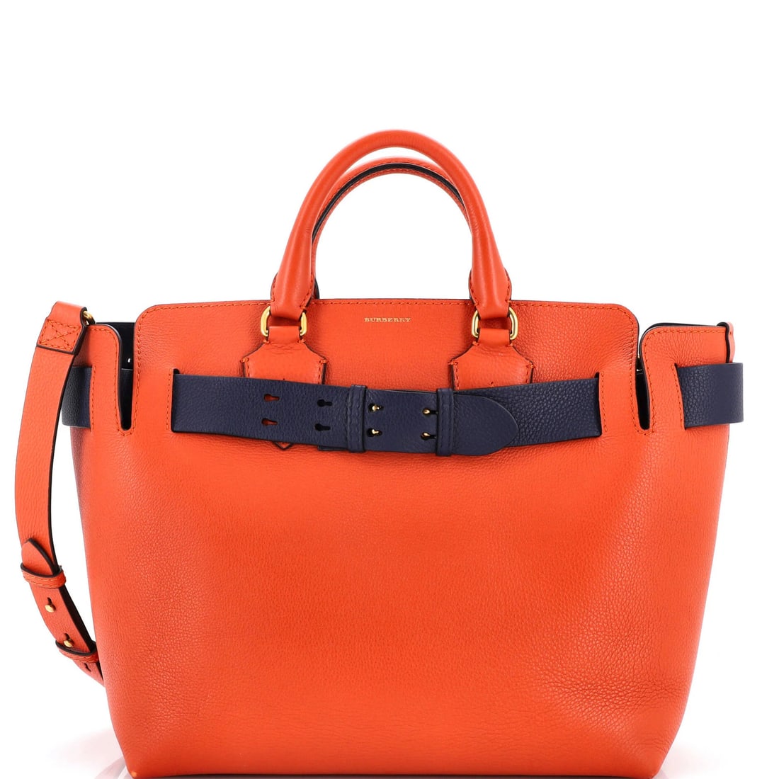 Large Burberry Belt Tote Leather: Large Burberry Belt Tote Leather Experience the iconic style of Burberry with this stunning Large Belt Tote Leather bag, boasting vibrant orange exterior and rich blue interior accents. Its classic