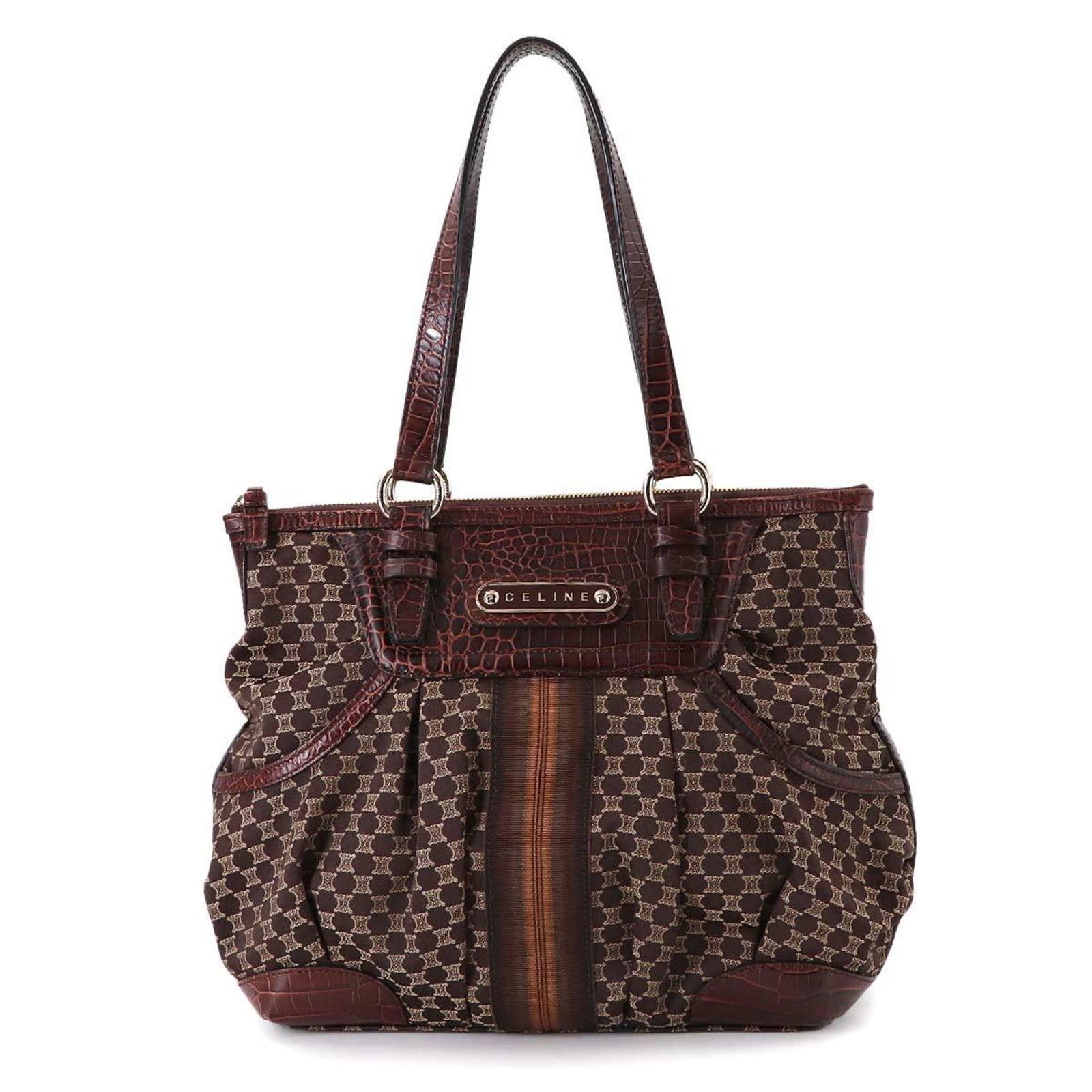 Celine Canvas and Leather Handbag: Celine Canvas and Leather Handbag A stunning Celine handbag in mint condition, this dark brown canvas and leather tote boasts clean lines and timeless elegance. With its spacious interior and sturdy l