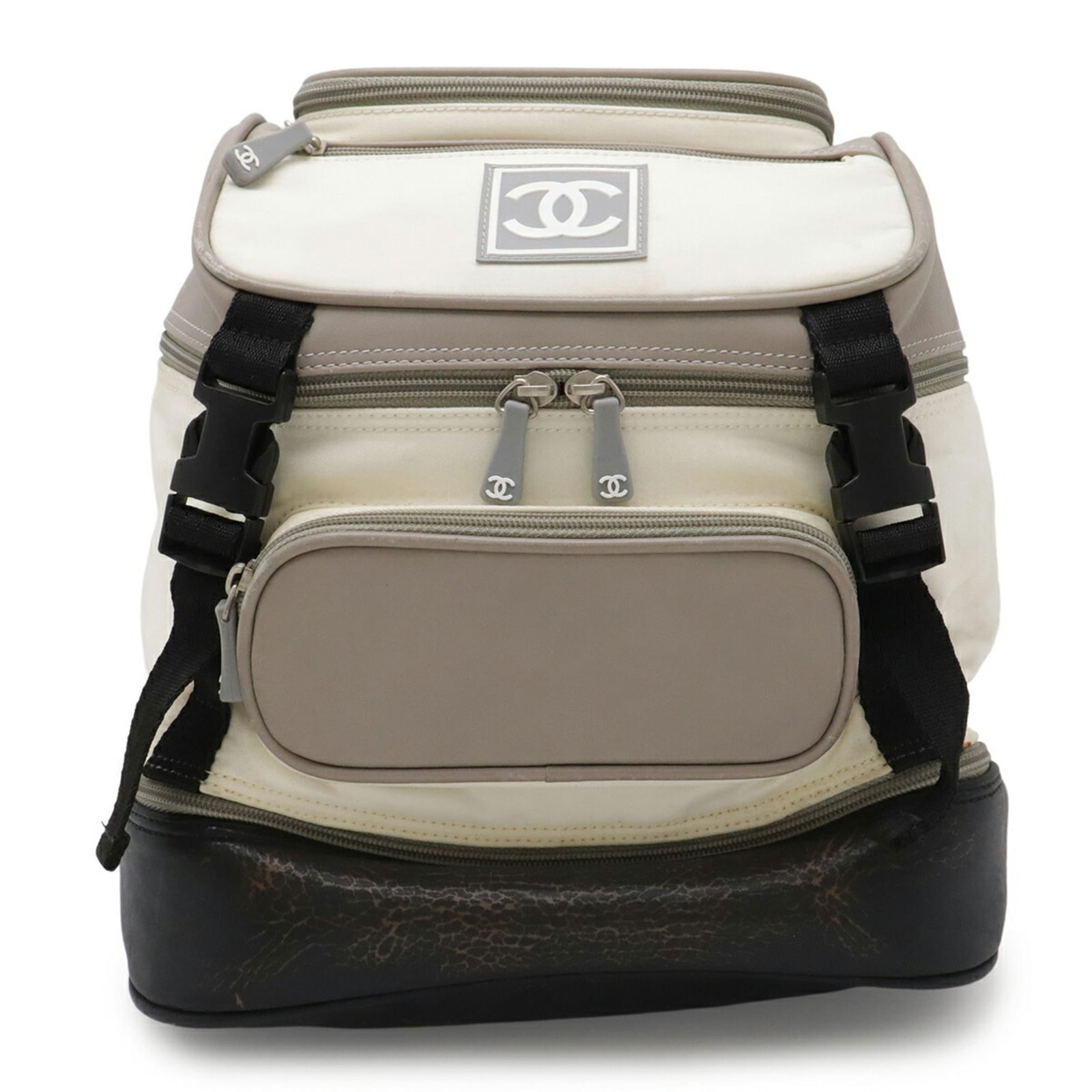 Chanel Backpack in Nylon, Rubber, and Leather: Chanel Backpack in Nylon, Rubber, and Leather A pre-owned Chanel backpack in sleek black, gray, or ivory, crafted from durable nylon, rubber, and supple leather. With its classic design and timeless a