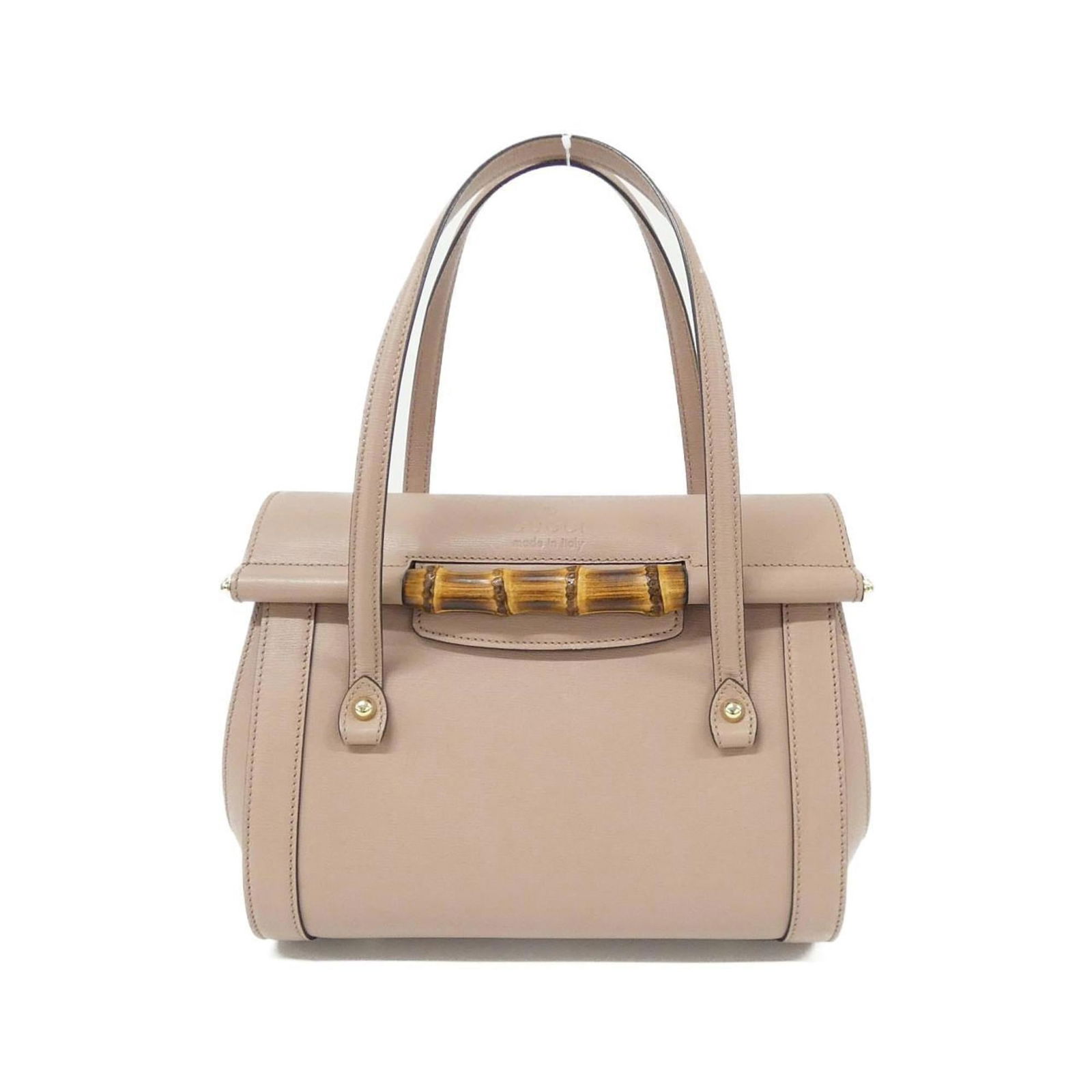 Gucci Leather Handbag: Gucci Leather Handbag Experience the timeless elegance of Gucci with this stunning light pink leather handbag, adorned with gold hardware that adds a touch of sophistication to any outfit. With its cl