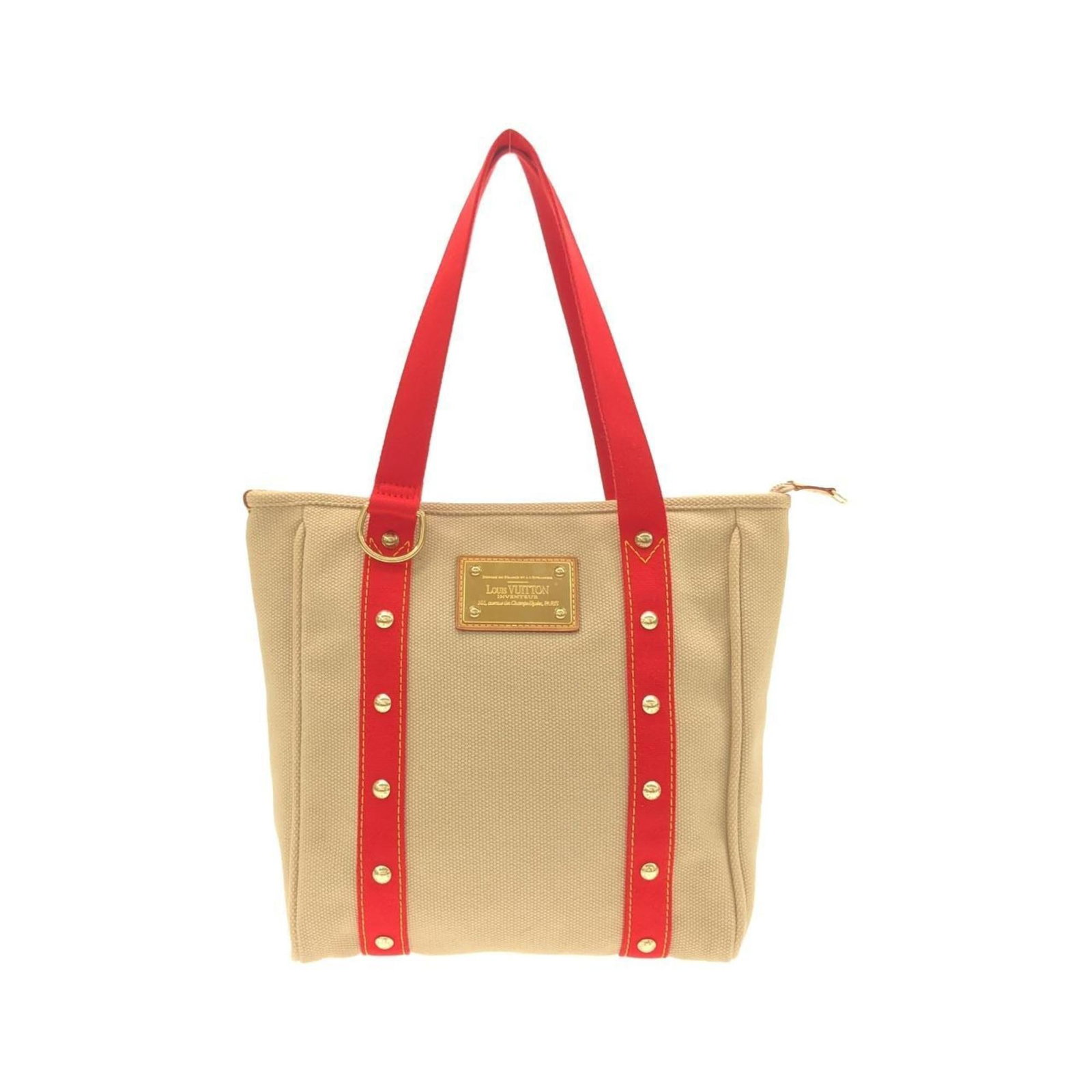Louis Vuitton Canvas Handbag: Louis Vuitton Canvas Handbag A timeless classic, this Louis Vuitton canvas handbag exudes elegance with its iconic monogram pattern and sleek design. Made from high-quality beige canvas, it boasts