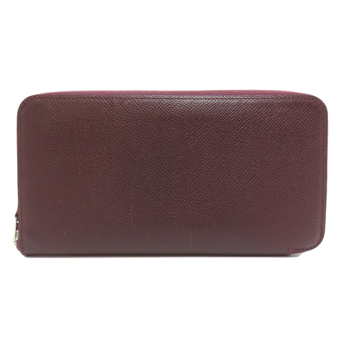 Epsom HERMES Azap Silk In SilverHardware Long wallet (with coin pocket): Epsom HERMES Azap Silk In SilverHardware Long wallet (with coin pocket) The Epsom HERMES Azap Silk Long wallet is a masterclass in understated elegance, boasting a rich Bordeaux exterior and luxurious