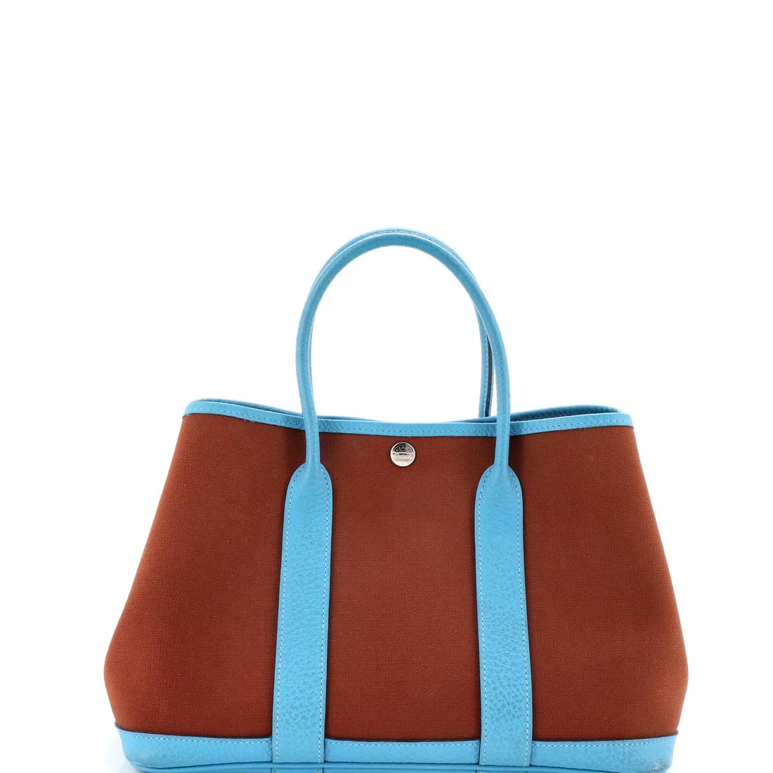 Hermes Garden Party Tote in Toile & Leather, 30: Hermes Garden Party Tote in Toile & Leather, 30 The iconic Hermes Garden Party Tote in Toile & Leather is a timeless classic, boasting a stunning blue and brown canvas exterior with intricate leather