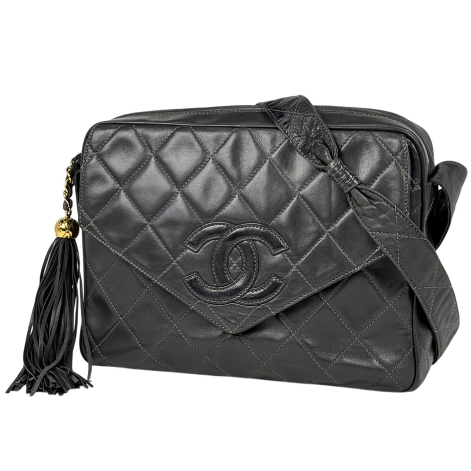Chanel Shoulder Bag in Leather: Chanel Shoulder Bag in Leather A timeless Chanel shoulder bag in sleek black leather, perfect for adding a touch of sophistication to any outfit. With its classic design and spacious interior, this