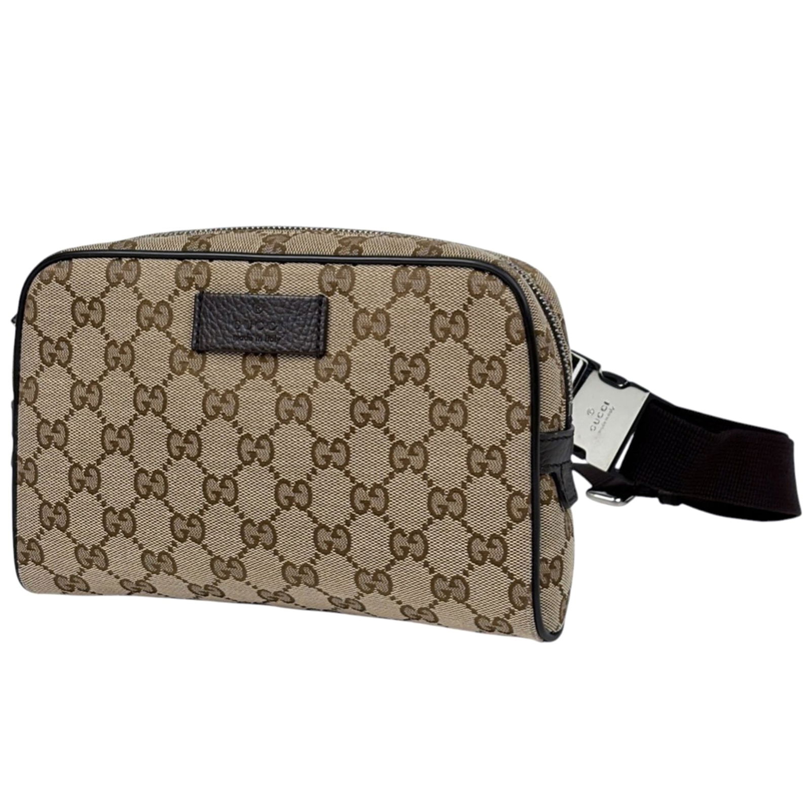 Gucci Sling Bag in Canvas and Leather: Gucci Sling Bag in Canvas and Leather A stylish and versatile Gucci sling bag, crafted from high-quality canvas and leather in rich brown tones, adds a touch of luxury to any outfit. With its classic