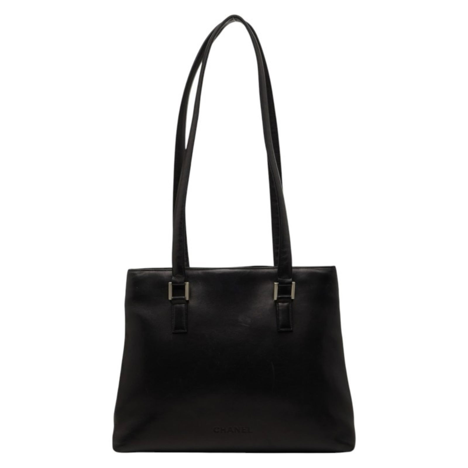 Chanel Leather Shoulder and Tote Bag: Chanel Leather Shoulder and Tote Bag A sleek and sophisticated Chanel leather shoulder bag, perfect for adding a touch of timeless elegance to any outfit. With its classic lambskin finish in rich