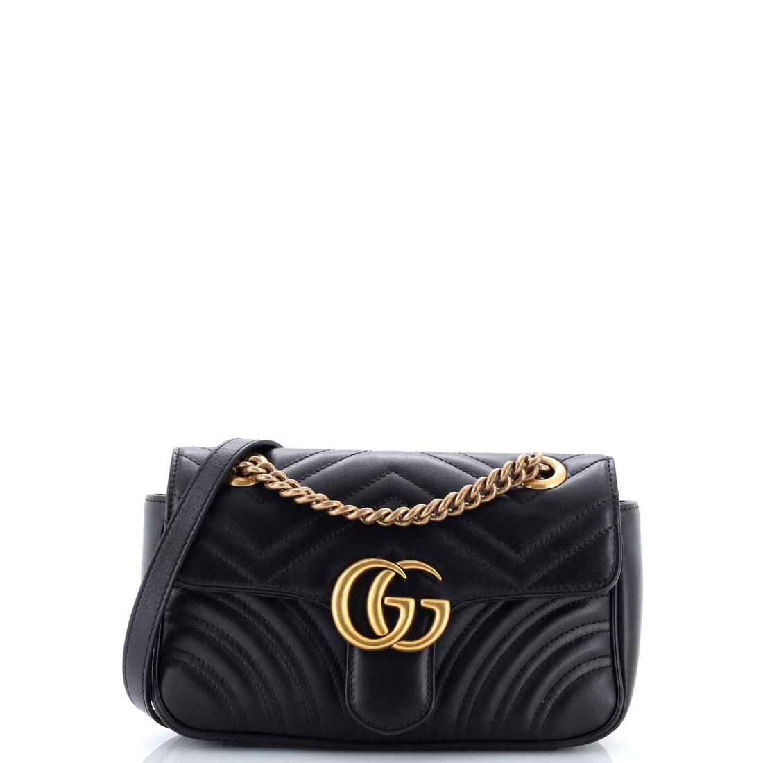 Gucci GG Marmont Mini Matelasse Leather Flap Bag: Gucci GG Marmont Mini Matelasse Leather Flap Bag The Gucci GG Marmont Mini Matelasse Leather Flap Bag is a chic and sophisticated accessory that exudes luxury. With its signature matelasse leather