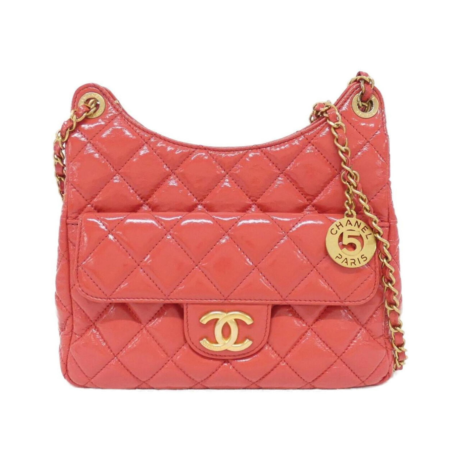 Chanel Shoulder Bag in Leather: Chanel Shoulder Bag in Leather A stunning Chanel shoulder bag in rich red leather, this timeless piece boasts classic design and luxurious feel. With its sleek matte gold hardware and supple calfskin