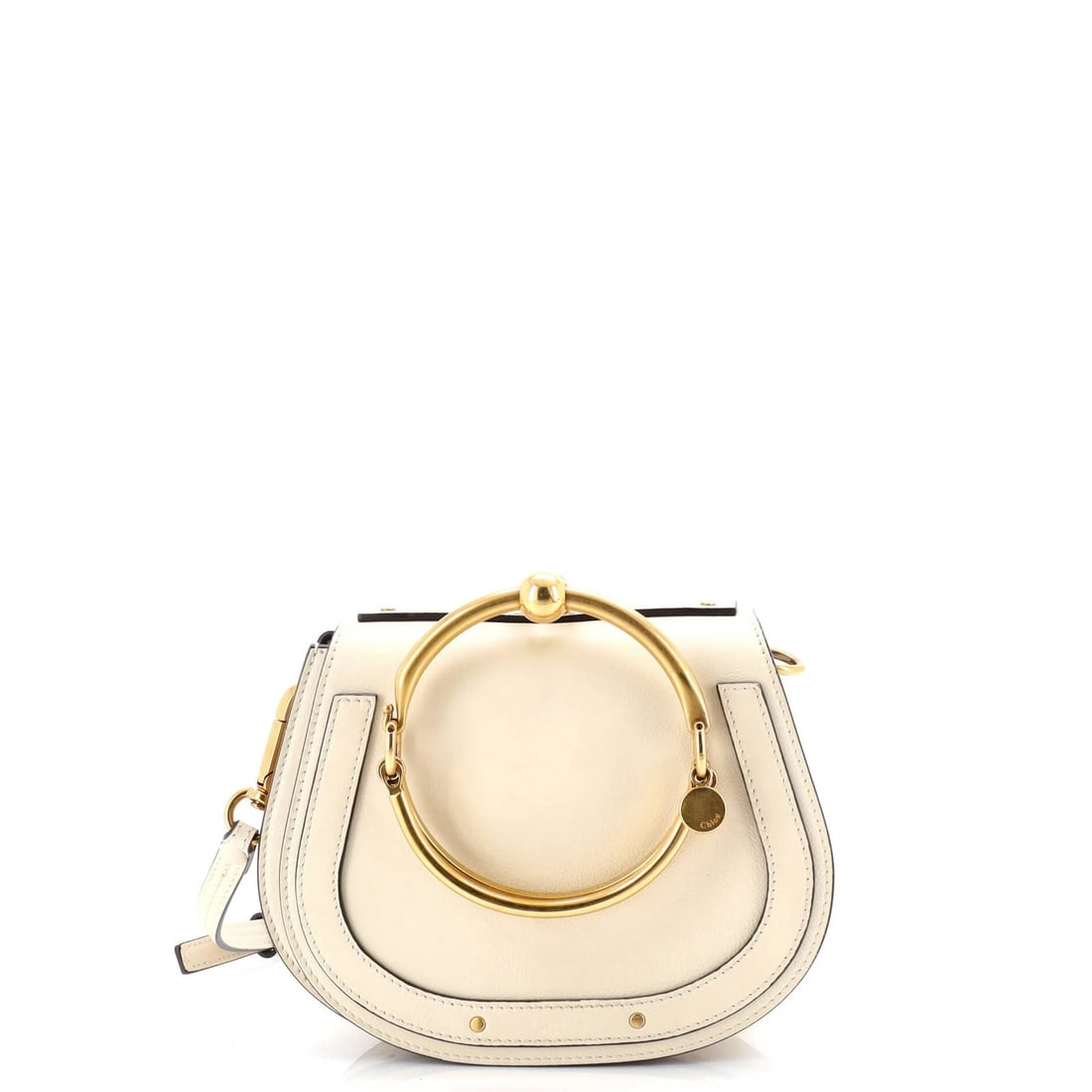 Chloe Nile Small Leather Crossbody Bag: Chloe Nile Small Leather Crossbody Bag Elevate your everyday style with the Chloe Nile Small Leather Crossbody Bag, boasting sleek neutral tones and supple suede interior. The bag's classic design is