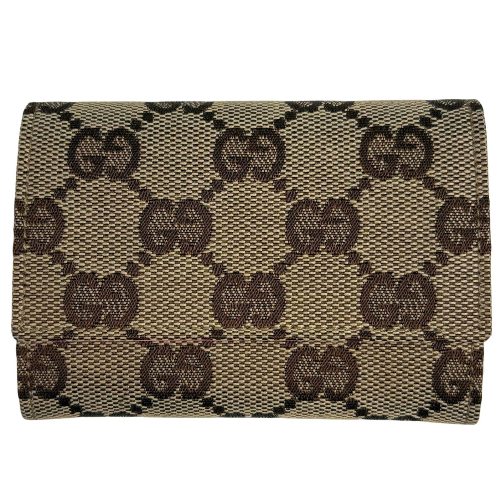 Gucci Coin Purse/ Case Gg Canvas: Gucci Coin Purse/ Case Gg Canvas A chic and timeless Gucci coin purse, crafted from high-quality gg canvas in a soft beige hue, adds a touch of elegance to any outfit. Its compact size makes it the