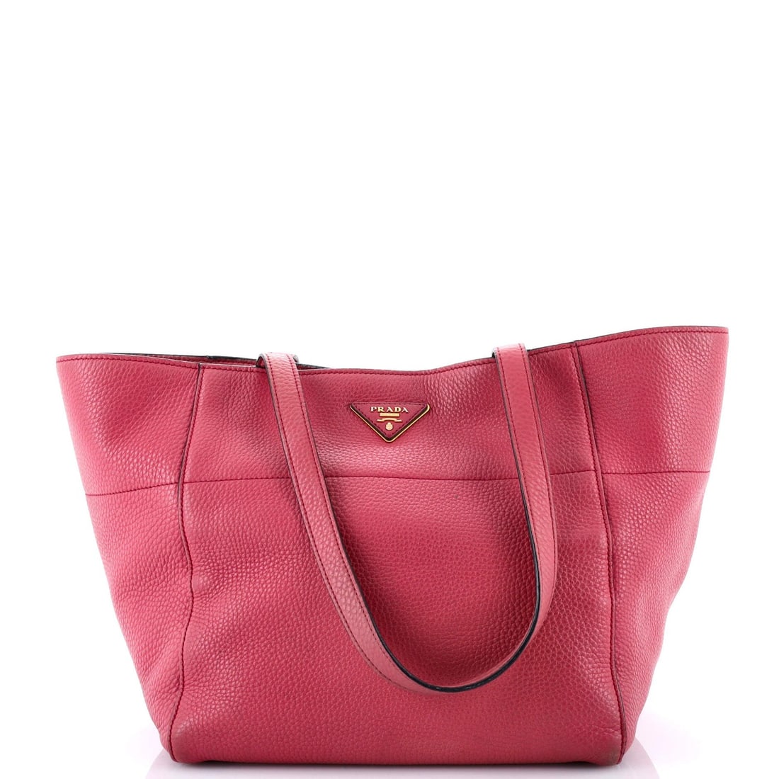 Prada Vitello Daino Mini Tote: Prada Vitello Daino Mini Tote The Prada Vitello Daino Mini Tote is a chic and versatile accessory that exudes luxury with its signature pink exterior and neutral interior. With its classic open tote