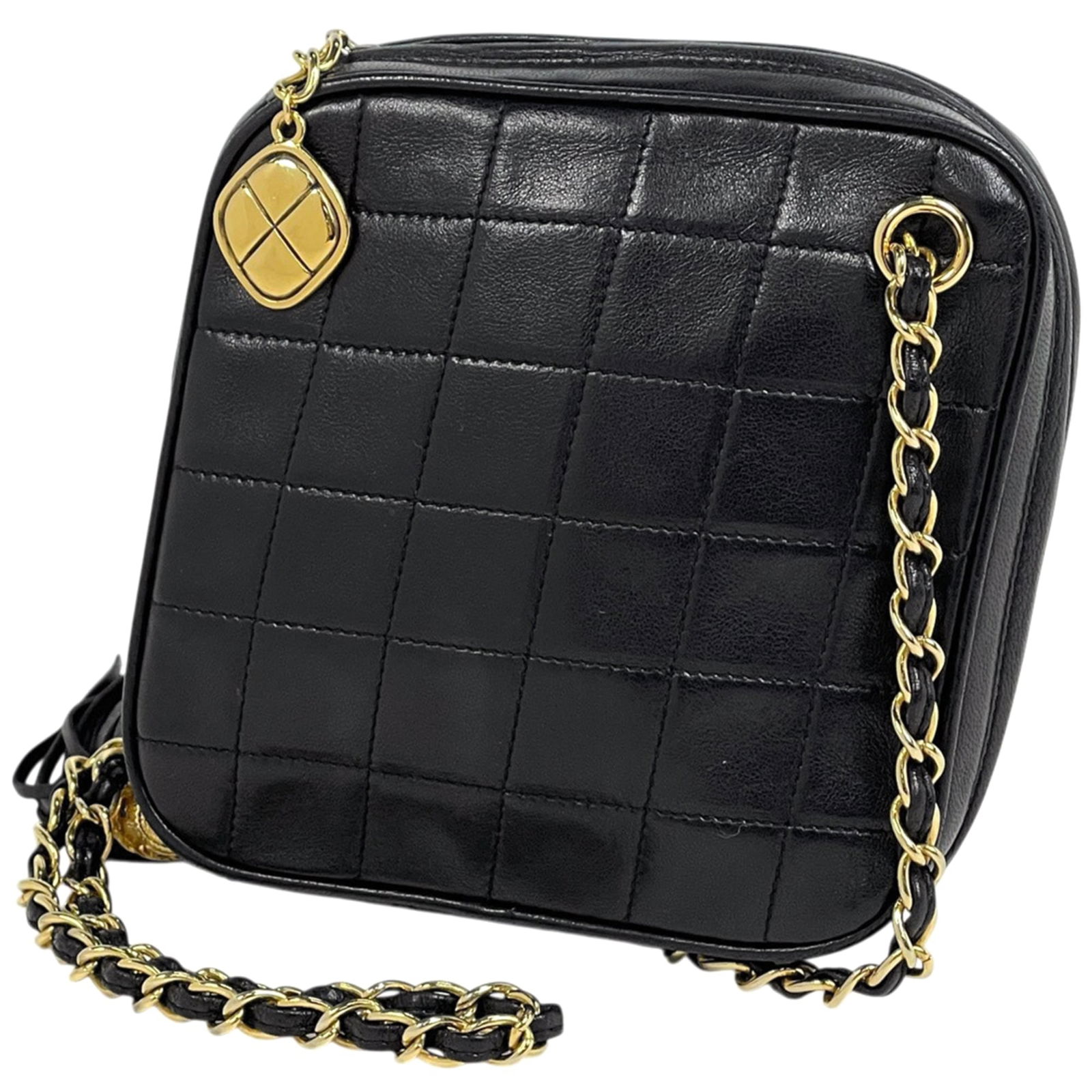 Chanel Shoulder Bag in Leather: Chanel Shoulder Bag in Leather A sleek and timeless Chanel shoulder bag in black leather, perfect for adding a touch of sophisticated elegance to any outfit. With its classic design and durable constr