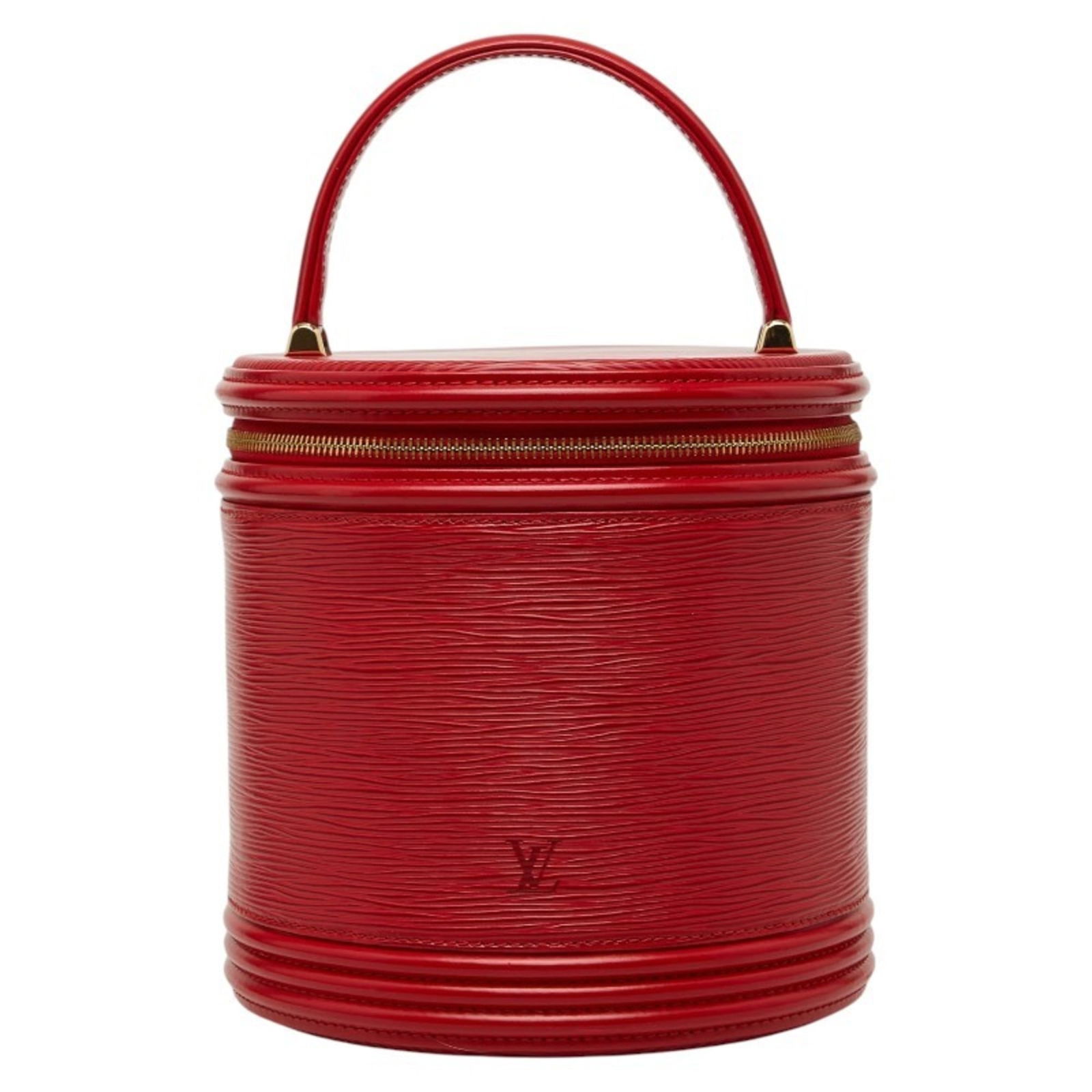 Louis Vuitton Vanity Bag in Leather: Louis Vuitton Vanity Bag in Leather A stunning Castilian Red Louis Vuitton leather vanity bag, perfect for adding a touch of luxury to your daily routine. With its classic design and timeless red