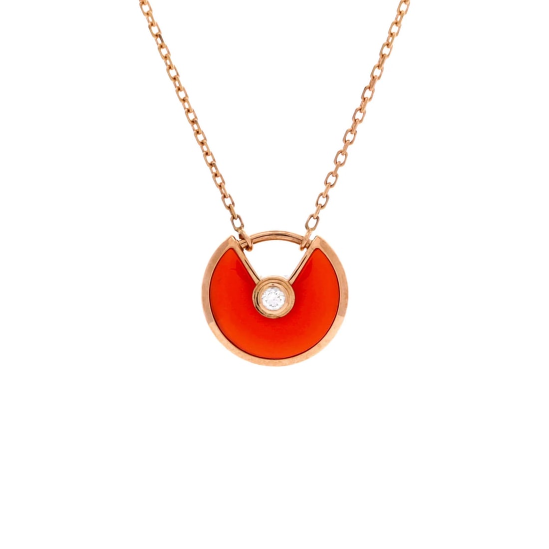 Cartier Amulette de Pendant Necklace 18K Rose Gold with Carnelian: Cartier Amulette de Pendant Necklace 18K Rose Gold with Carnelian The Cartier Amulette de Pendant Necklace is a stunning 18K rose gold piece adorned with a vibrant carnelian stone and delicate