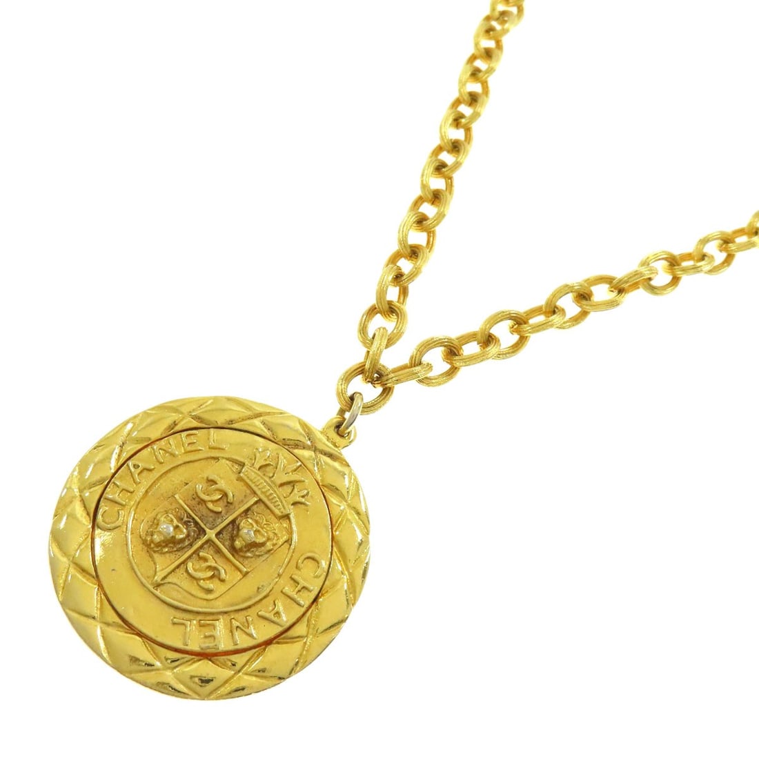 Chanel Matelasse Round Frame Pendant Necklace (Reversible): Chanel Matelasse Round Frame Pendant Necklace (Reversible) Elevate your elegance with the timeless Chanel Matelasse Round Frame Pendant Necklace, crafted in luxurious gold and reversible for endless
