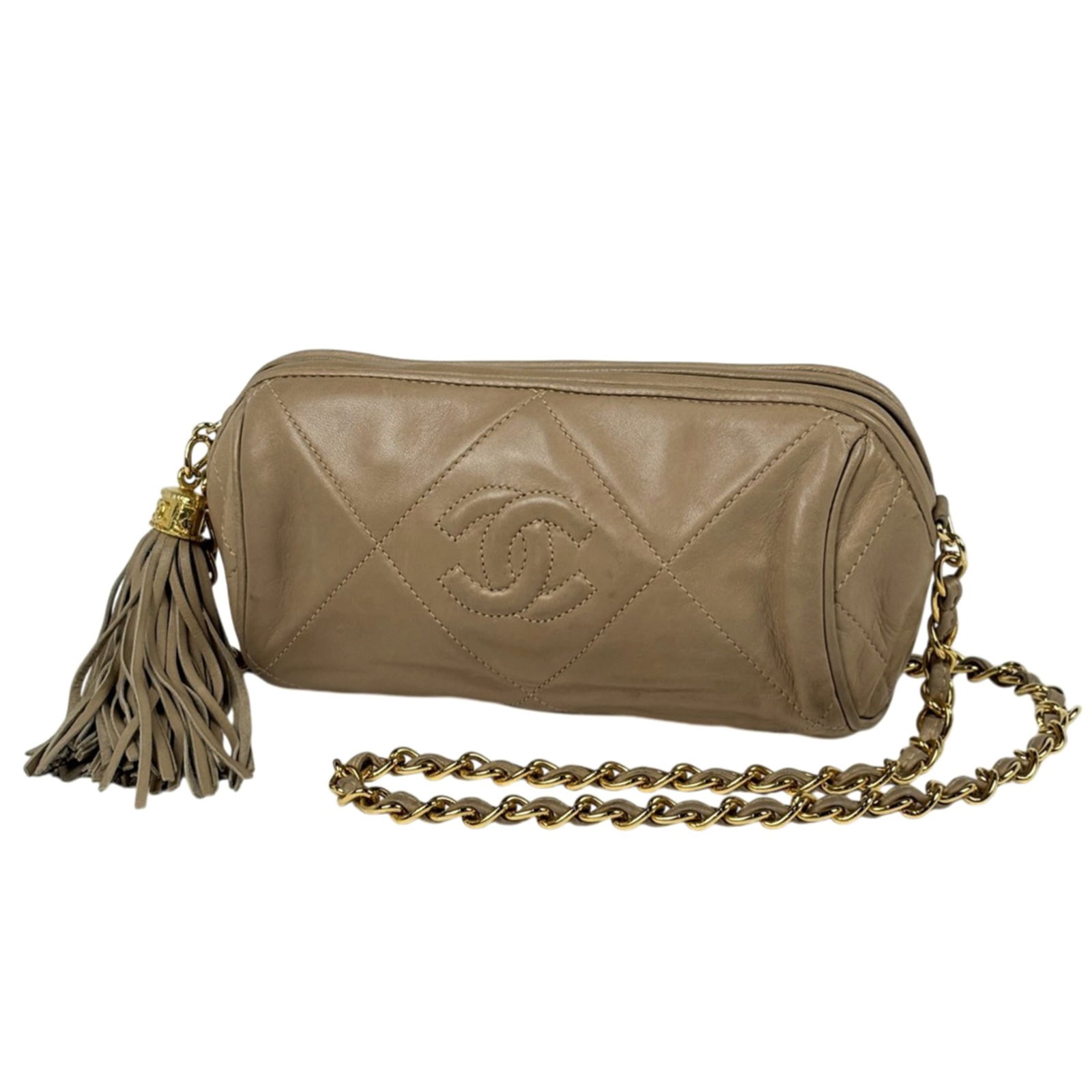 Chanel Shoulder Bag in Leather: Chanel Shoulder Bag in Leather A timeless Chanel shoulder bag in rich beige leather, perfect for adding an air of sophistication to any outfit. With its classic design and sturdy construction, this ba