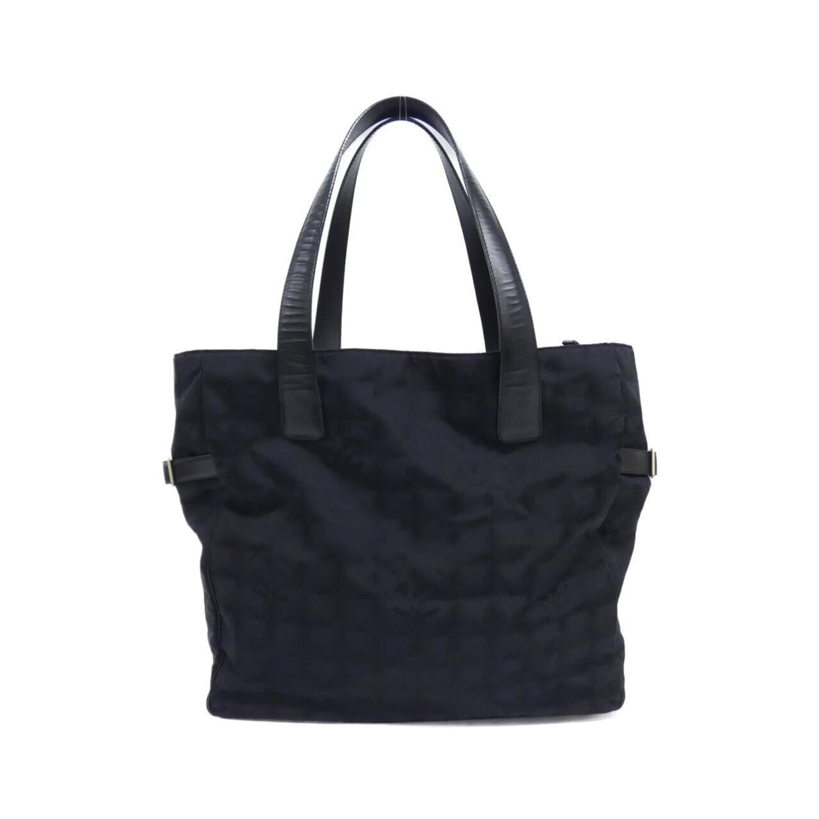 Chanel Shoulder Bag in Nylon: Chanel Shoulder Bag in Nylon A chic and timeless Chanel shoulder bag in sleek black nylon, adorned with matte gold hardware, adds an air of sophistication to any outfit. With its compact size and