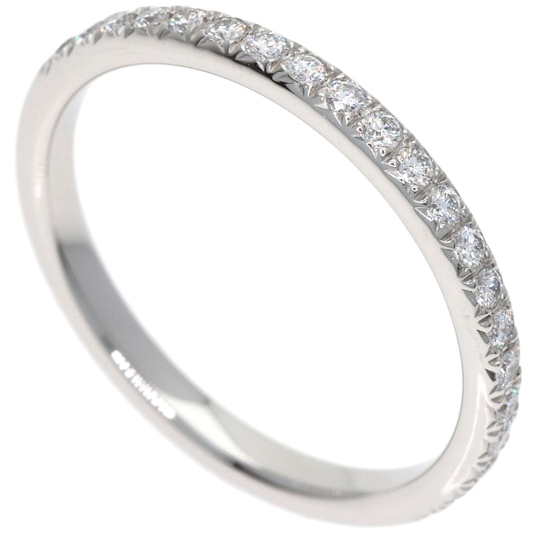 Platinum Piaget Half Eternity Diamond Ring #47: Platinum Piaget Half Eternity Diamond Ring #47 Experience the timeless elegance of Piaget's Half Eternity Diamond Ring, crafted from 950 platinum for a luxurious touch. This stunning piece boasts a
