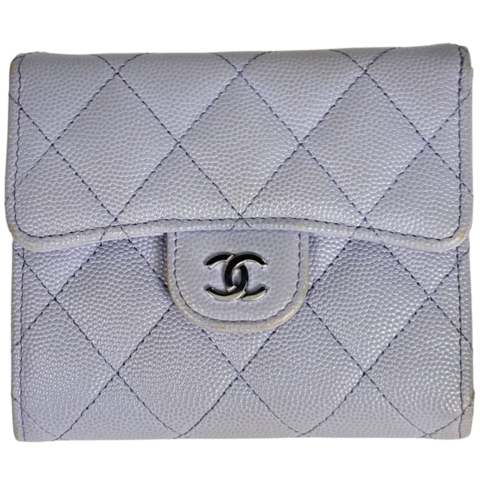 Chanel Tri-Fold Grained Calfskin Wallet: Chanel Tri-Fold Grained Calfskin Wallet A truly timeless piece, the Chanel Tri-Fold Grained Calfskin Wallet is a masterclass in understated elegance. With its rich purple hue and classic tri-fold