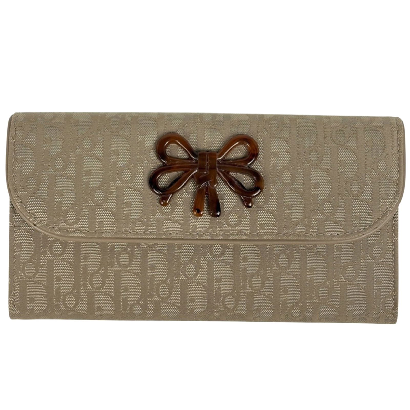 Christian Dior Bi-Fold Canvas and Leather Wallet: Christian Dior Bi-Fold Canvas and Leather Wallet A chic and timeless piece from Christian Dior, this bi-fold wallet boasts a sleek canvas and leather design in classic beige hues. With its spacious