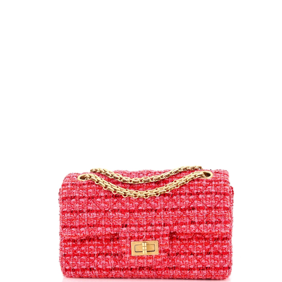 Chanel Mini 2.55 Tweed Flap Bag: Chanel Mini 2.55 Tweed Flap Bag Experience the timeless elegance of the iconic Chanel Mini 2.55 Tweed Flap Bag, reimagined for the modern woman. With its classic quilted tweed exterior and signature