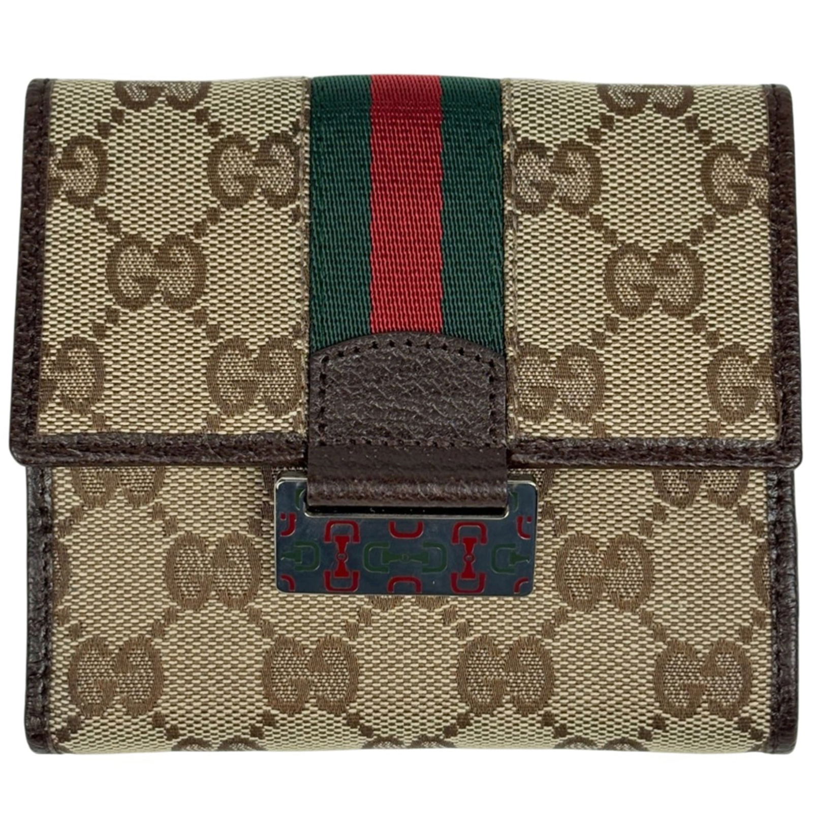 Gucci Bi-Fold Wallet in Gg Canvas and Leather: Gucci Bi-Fold Wallet in Gg Canvas and Leather A stylish and versatile Gucci bi-fold wallet, crafted from high-quality Gg canvas and supple leather, adds a touch of luxury to any outfit. With its