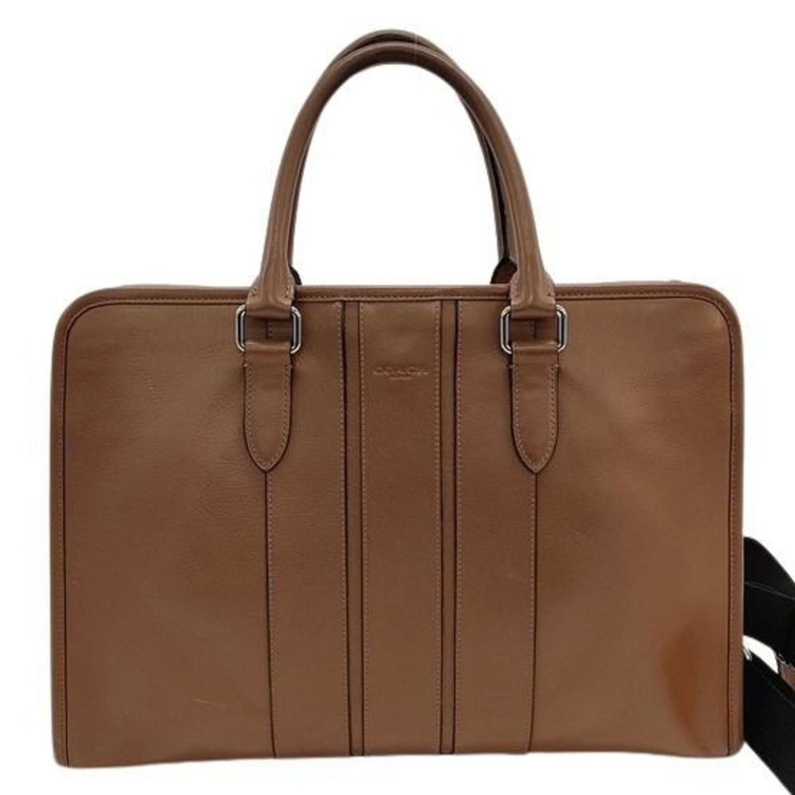 Coach Leather Briefcase, Handbag & Tote: Coach Leather Briefcase, Handbag & Tote A stylish and versatile Coach leather bag, perfect for work or everyday use, boasts rich brown leather and classic design elements that exude timeless