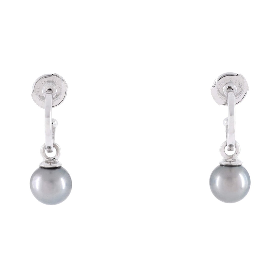 Christian Dior Drop Hoop Earrings in 18k White Gold & Pearl: Christian Dior Drop Hoop Earrings in 18k White Gold & Pearl Elevate your everyday style with these stunning 18k white gold drop hoop earrings adorned with luminous pearls, adding a touch of
