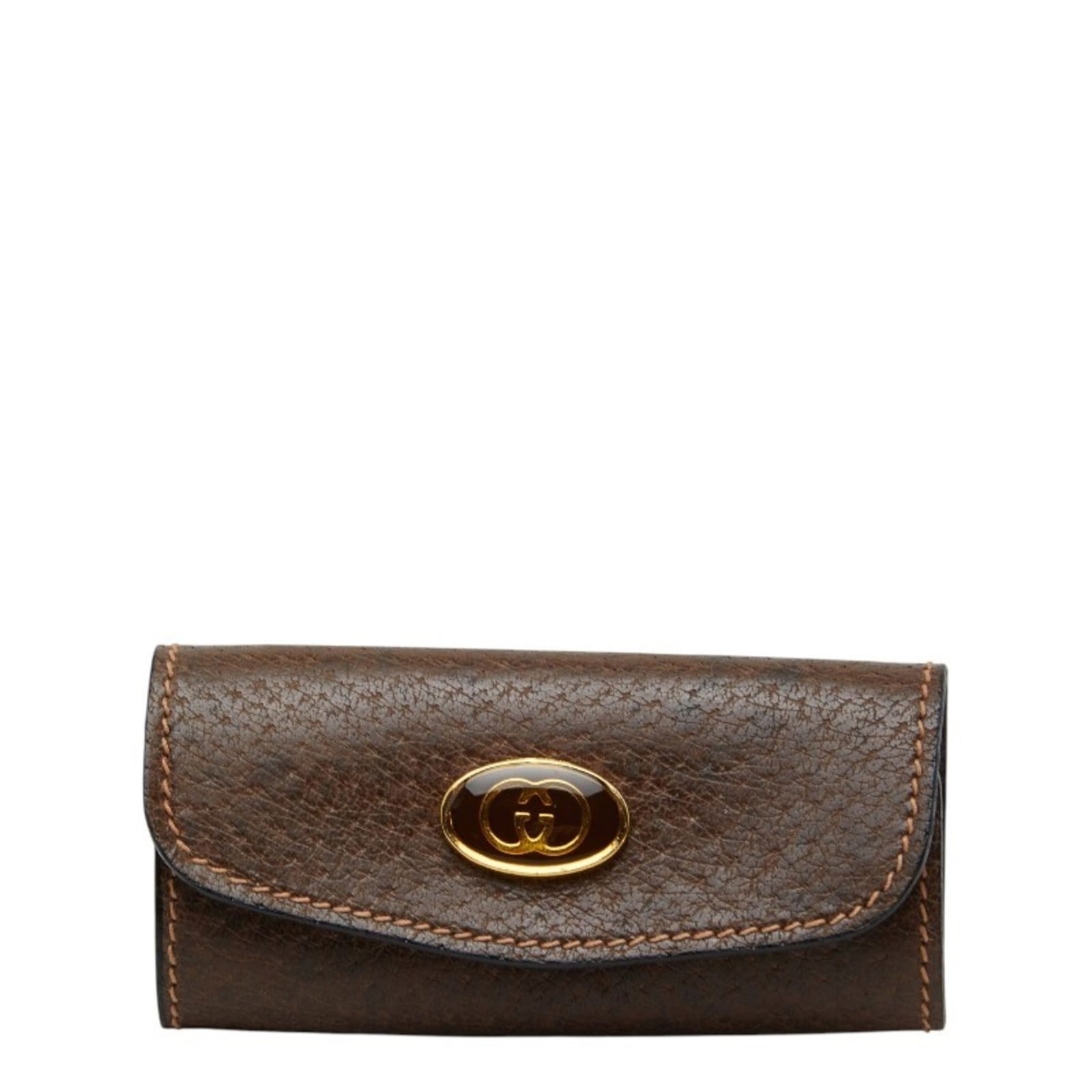 Leather Gucci Keycase: Leather Gucci Keycase A stylish and timeless accessory, this Gucci leather keycase is crafted from rich brown leather with subtle scratches and signs of wear, adding to its authentic charm. Perfect