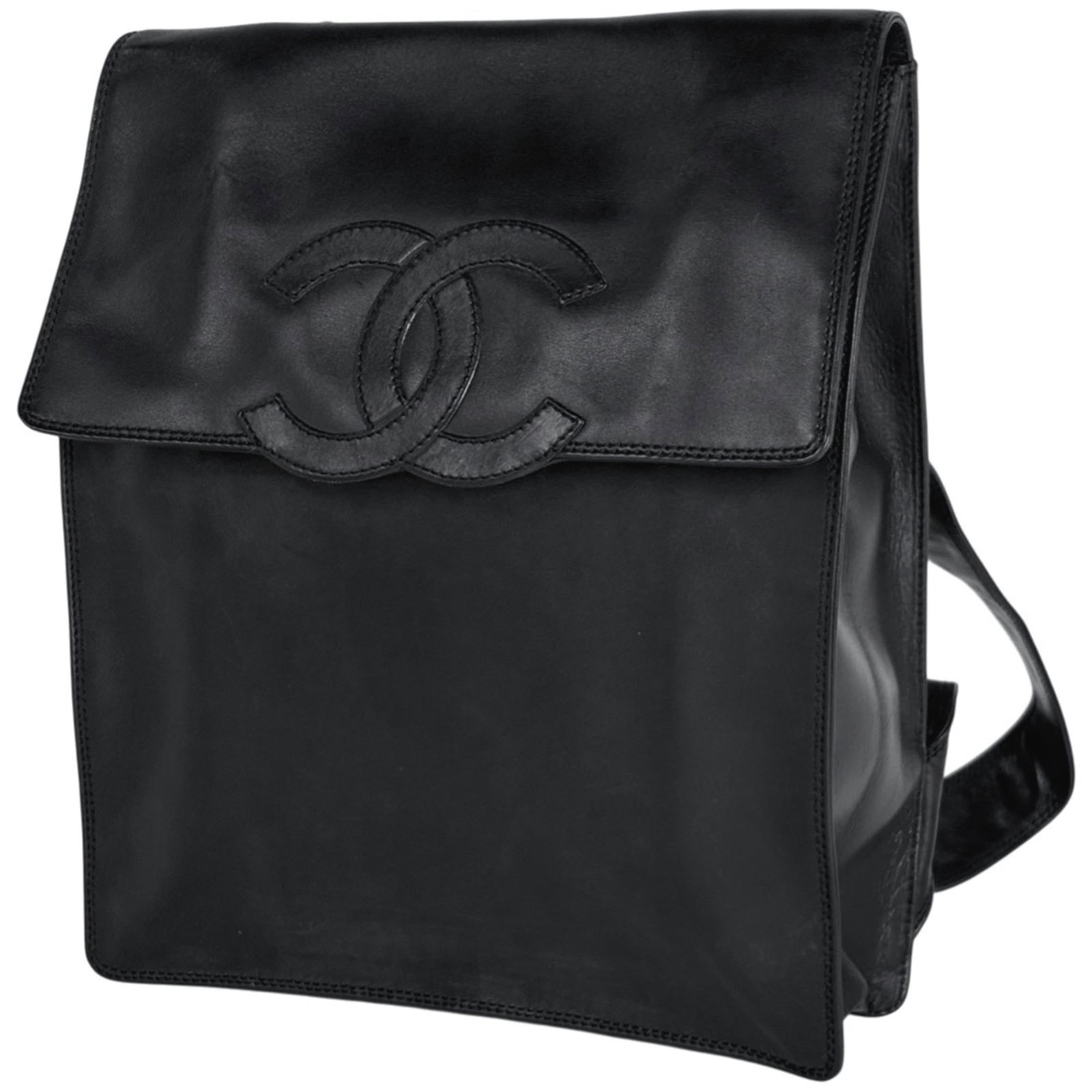 Chanel Leather Backpack: Chanel Leather Backpack A timeless Chanel leather backpack in sleek black, perfect for adding an air of sophistication to any outfit. With its classic design and premium leather construction, this bag