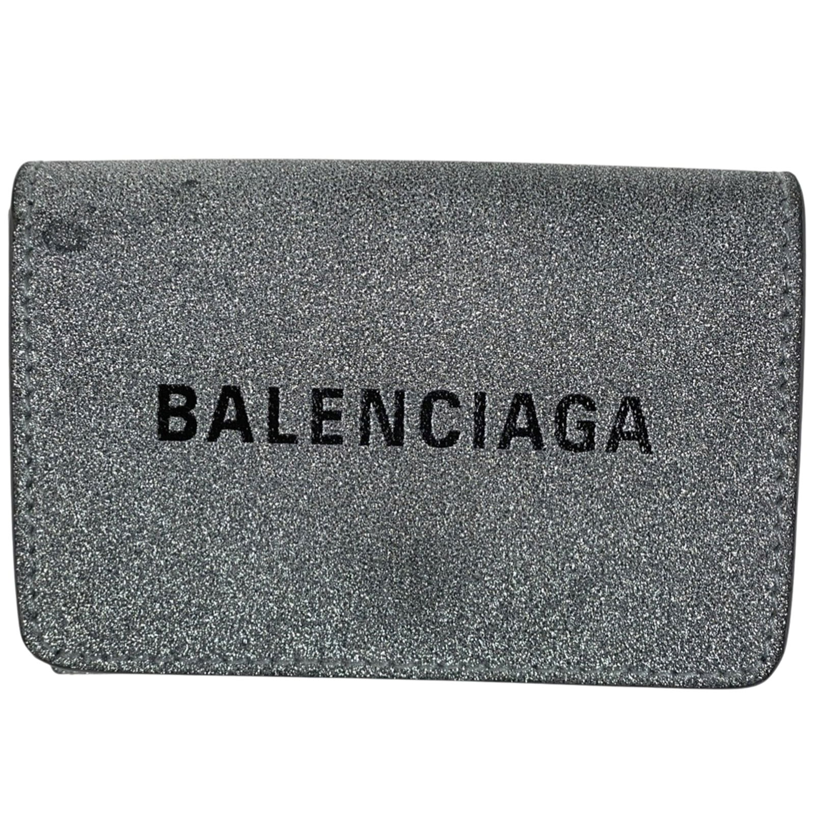 Balenciaga Tri-Fold Leather Wallet: Balenciaga Tri-Fold Leather Wallet Elevate your everyday with the iconic Balenciaga Tri-Fold Leather Wallet, boasting sleek silver hardware and premium leather construction that exudes