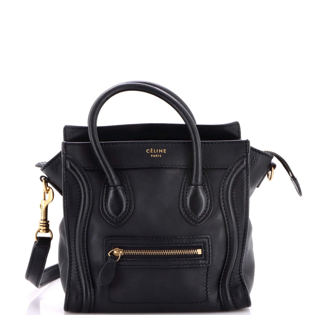 Celine Nano Smooth Leather Luggage Bag: Celine Nano Smooth Leather Luggage Bag Elevate your travel style with the iconic Celine Nano Smooth Leather Luggage Bag, boasting sleek black leather exterior and gold hardware details that add a