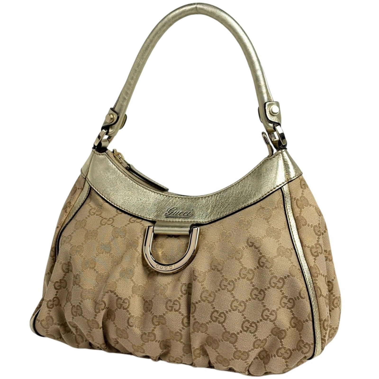 Leather - Gucci Handbag - Shoulder Bag Gg Canvas: Leather - Gucci Handbag - Shoulder Bag Gg Canvas A luxurious Gucci shoulder bag in beige gold, crafted from high-quality Gg Canvas and rich leather, adds a touch of sophistication to any outfit. With