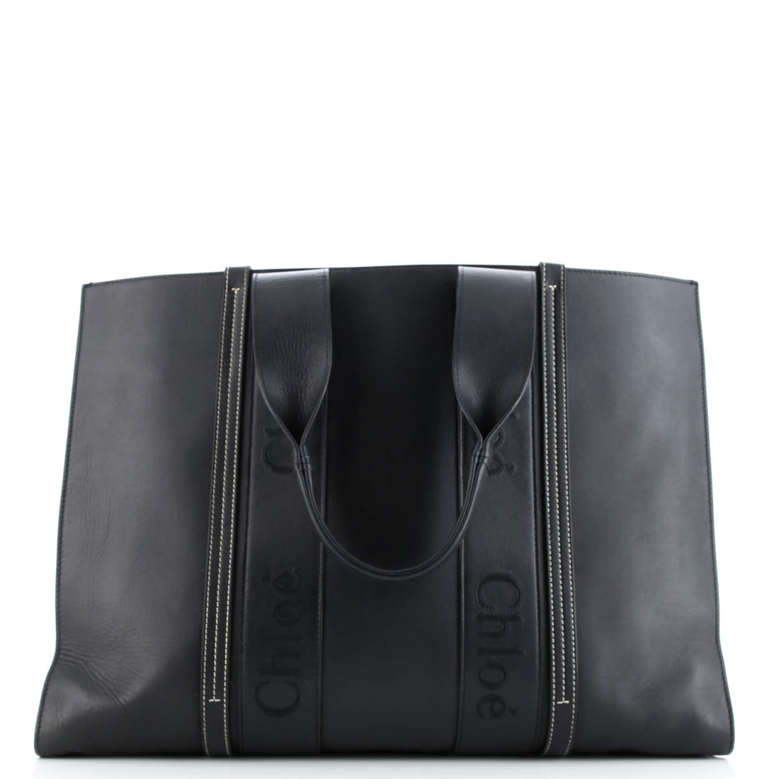 Chloe Large Leather Tote: Chloe Large Leather Tote A timeless Chloe Large Leather Tote in sleek black, perfect for everyday essentials and stylish outings. With its spacious interior featuring neutral fabric lining and
