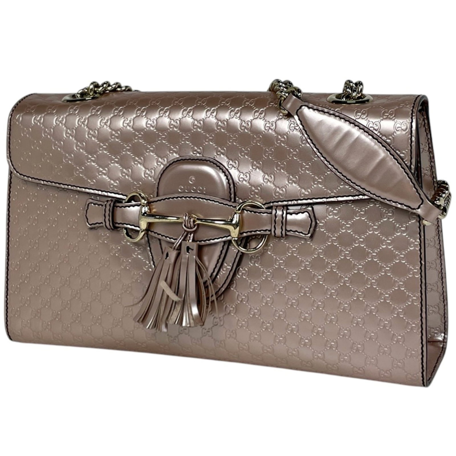 Gucci GG Leather Shoulder Bag: Gucci GG Leather Shoulder Bag A stylish and versatile pink beige Gucci GG Leather Shoulder Bag, perfect for adding a touch of luxury to your daily routine. With its iconic GG pattern and high-quality