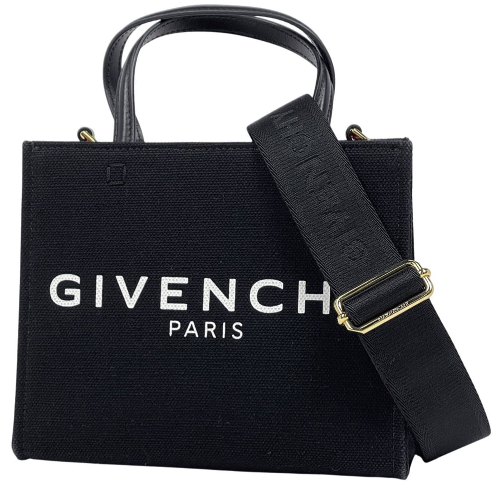 Givenchy Canvas Tote Bag in Leather: Givenchy Canvas Tote Bag in Leather A chic and timeless piece, this Givenchy canvas tote bag in leather is perfect for everyday essentials. With its classic design and durable construction, it's ideal