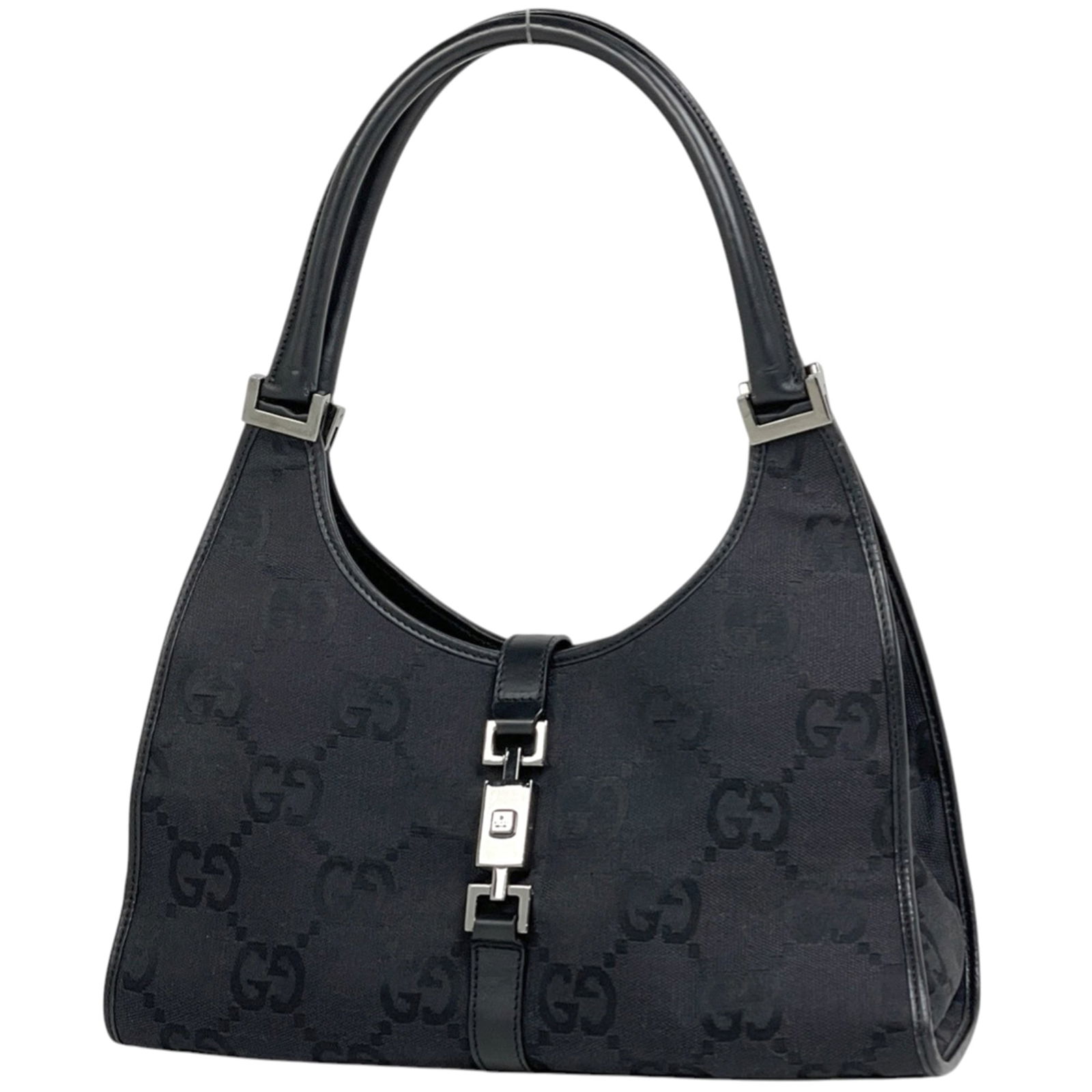 Gucci Canvas and Leather Handbag: Gucci Canvas and Leather Handbag A sleek and sophisticated Gucci canvas and leather handbag, perfect for adding an air of luxury to any outfit, boasts a striking black color and timeless design that e