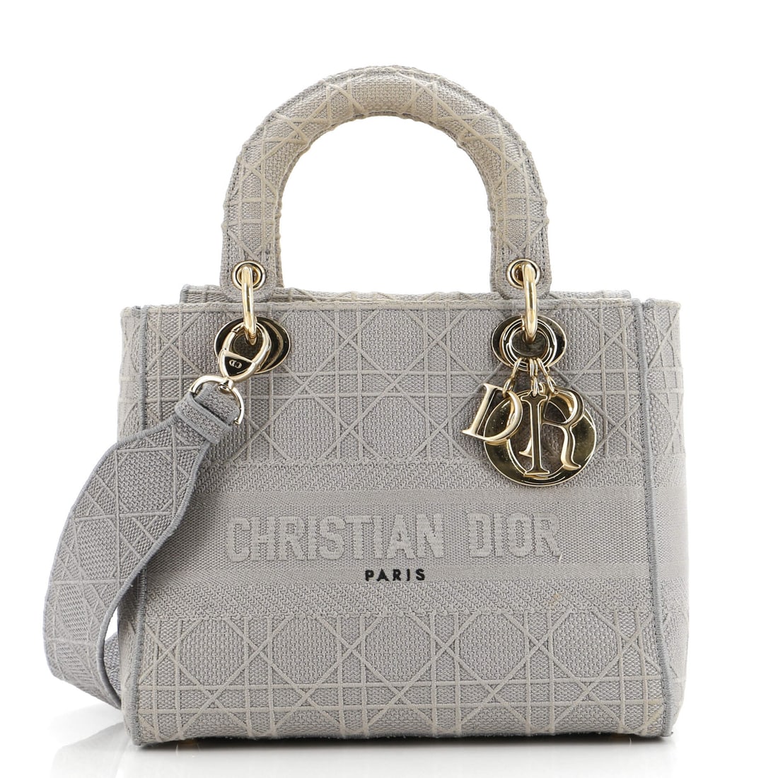 Christian Dior Lady D-Lite Bag - Cannage Embroidered Canvas Medium: Christian Dior Lady D-Lite Bag - Cannage Embroidered Canvas Medium The Christian Dior Lady D-Lite Bag is a timeless masterpiece, boasting a striking Cannage embroidered canvas exterior in a sleek