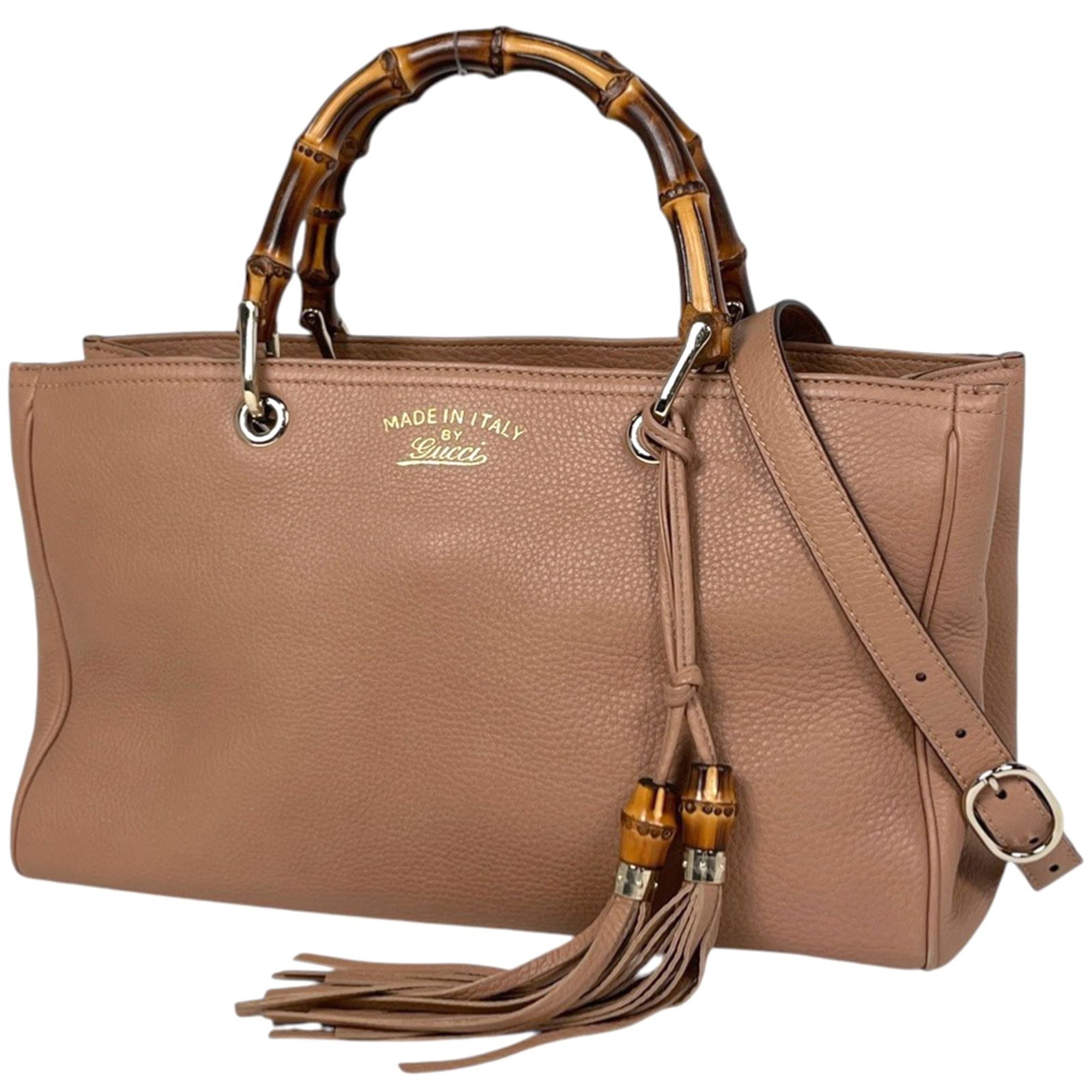 Gucci Leather Tote Bag: Gucci Leather Tote Bag A timeless Gucci tote bag in rich beige leather, perfect for adding an air of sophistication to any outfit. With its classic shoulder strap and spacious interior, this stylish