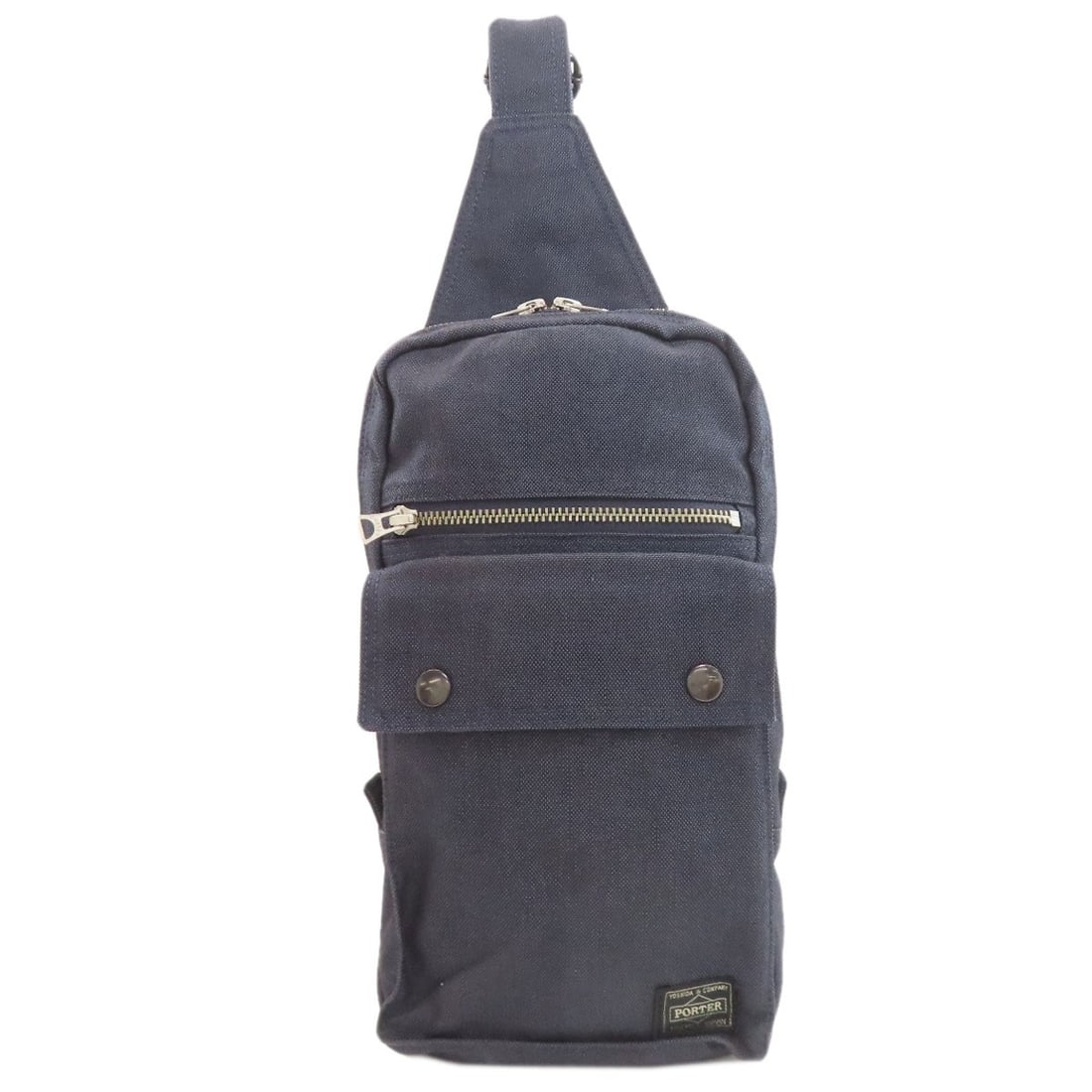 Canvas Porter Body Bag: Canvas Porter Body Bag Elevate your daily style with the rugged charm of our Canvas Porter Body Bag, crafted from high-quality navy canvas and originating from Japan. Its timeless design makes it