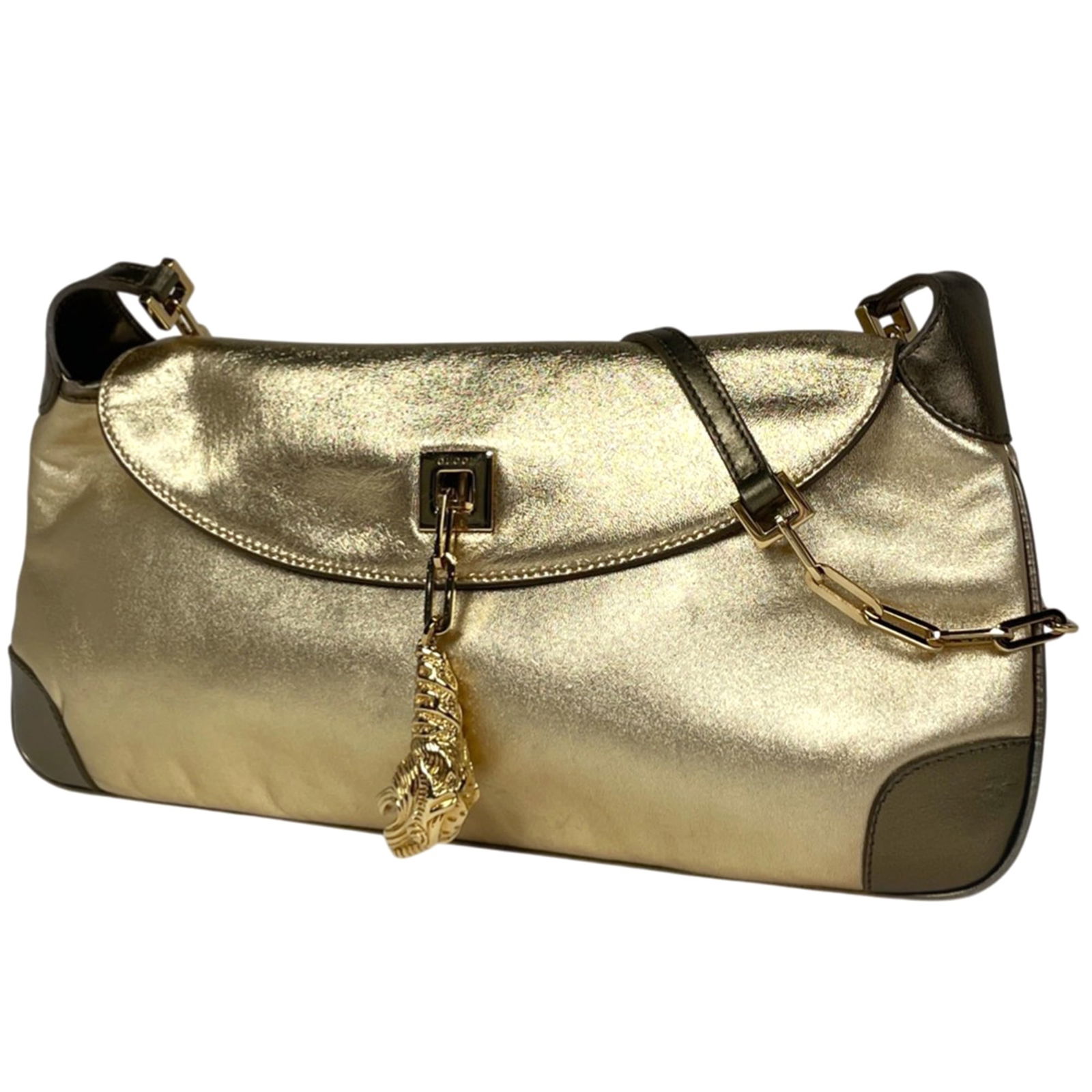 Gucci Leather Shoulder Bag: Gucci Leather Shoulder Bag A timeless Gucci leather shoulder bag in gold hue, boasting classic design and premium quality that exudes sophistication and elegance. With its spacious interior and sturdy