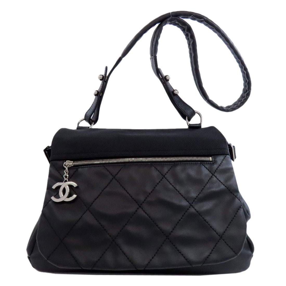 canvas CHANEL Paris Biarritz Shoulder Bag Coating: canvas CHANEL Paris Biarritz Shoulder Bag Coating The iconic CHANEL Paris Biarritz Shoulder Bag is a timeless classic, boasting a sleek black coating canvas exterior that exudes sophistication and