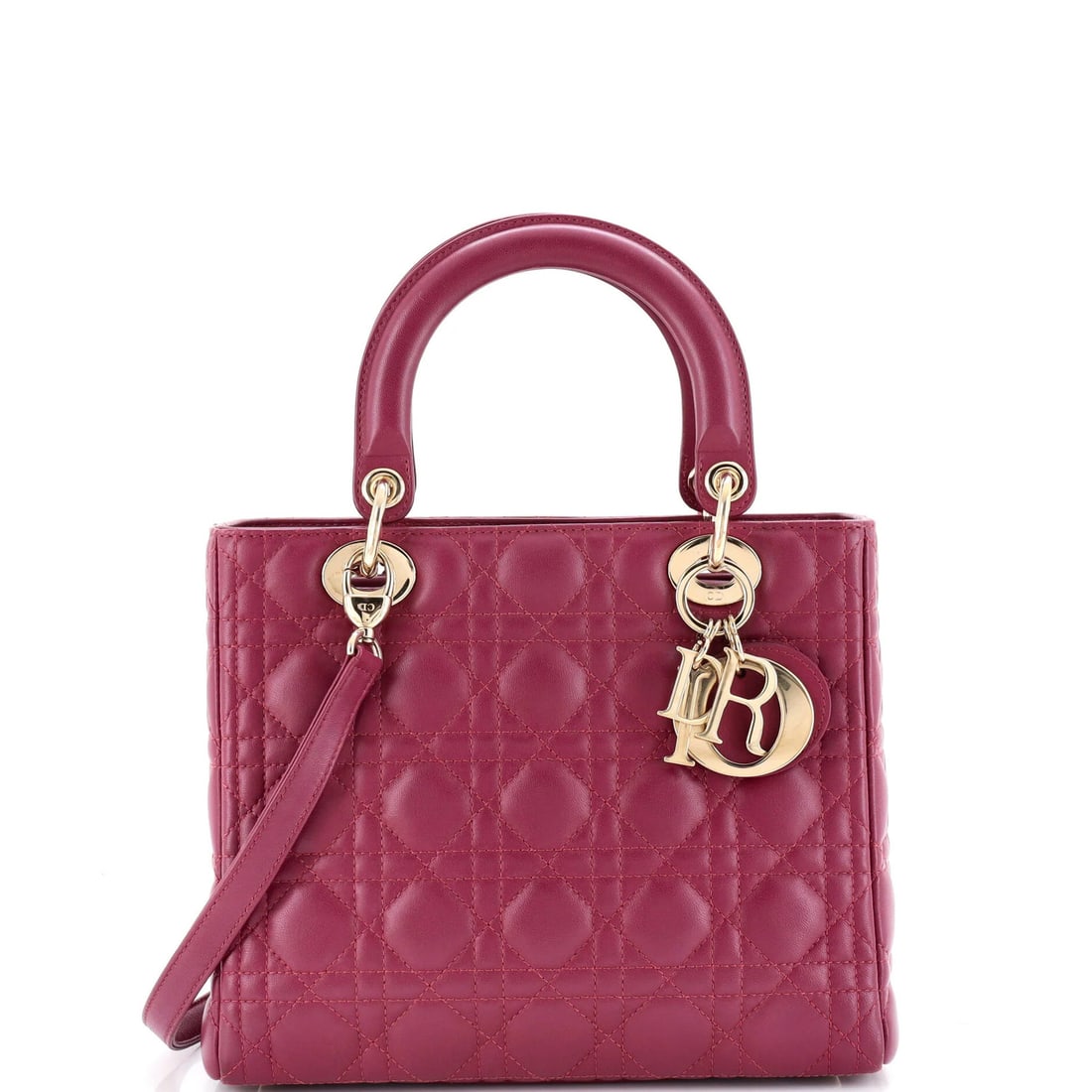 Christian Dior Lady Dior Bag - Cannage Quilt Lambskin Medium: Christian Dior Lady Dior Bag - Cannage Quilt Lambskin Medium The iconic Christian Dior Lady Dior Bag is a timeless masterpiece, boasting a stunning Cannage Quilt Lambskin exterior in rich purple hue.