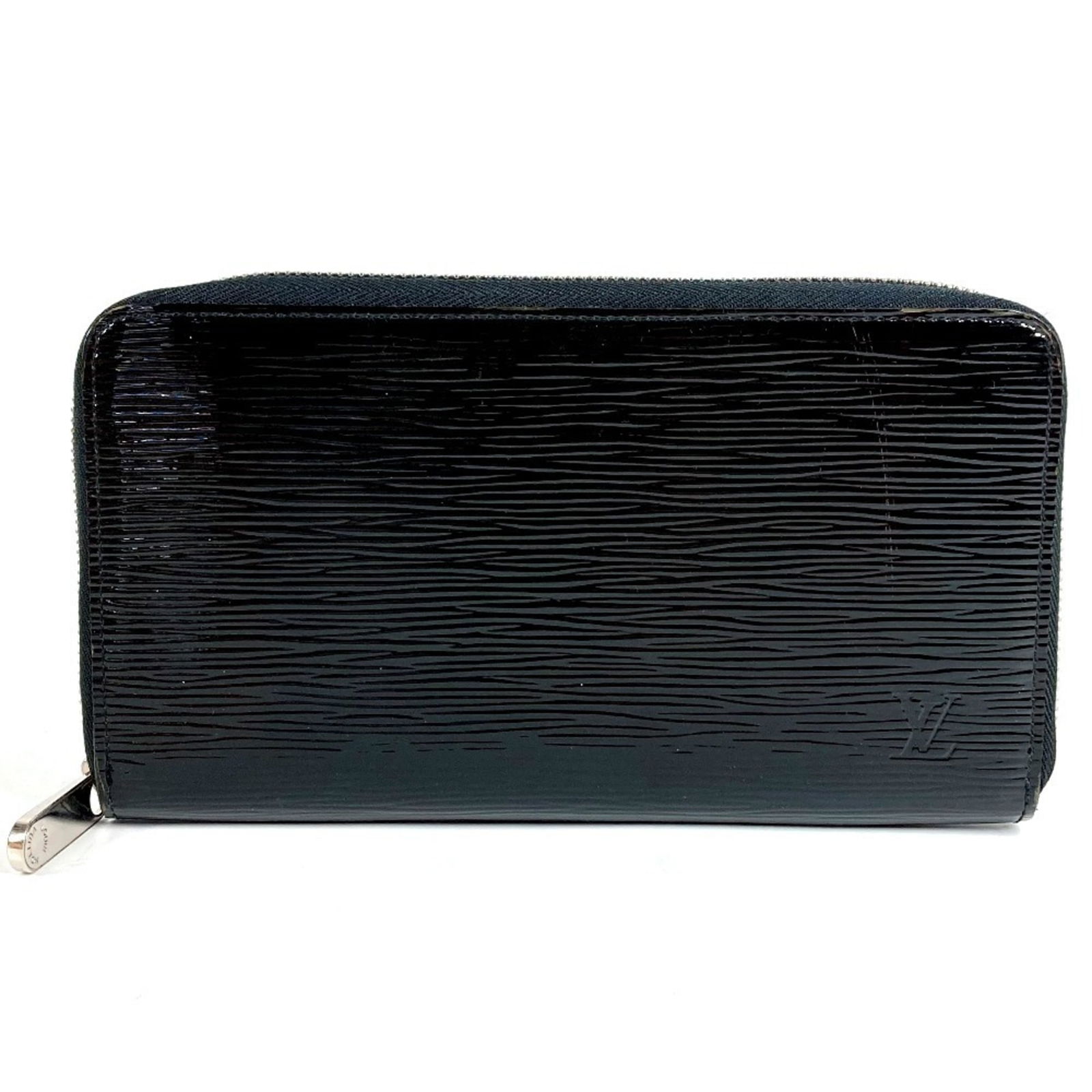 Louis Vuitton Bi-Fold Leather Wallet: Louis Vuitton Bi-Fold Leather Wallet A sleek and timeless accessory for the modern individual, this Louis Vuitton bi-fold leather wallet boasts classic design and premium quality. Made from rich