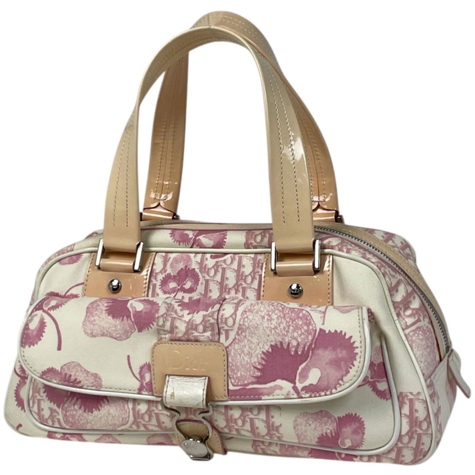 Christian Dior Canvas and Leather Handbag: Christian Dior Canvas and Leather Handbag A stunning Christian Dior handbag in soft pink beige canvas and supple leather, perfect for adding a touch of timeless elegance to any outfit. With its