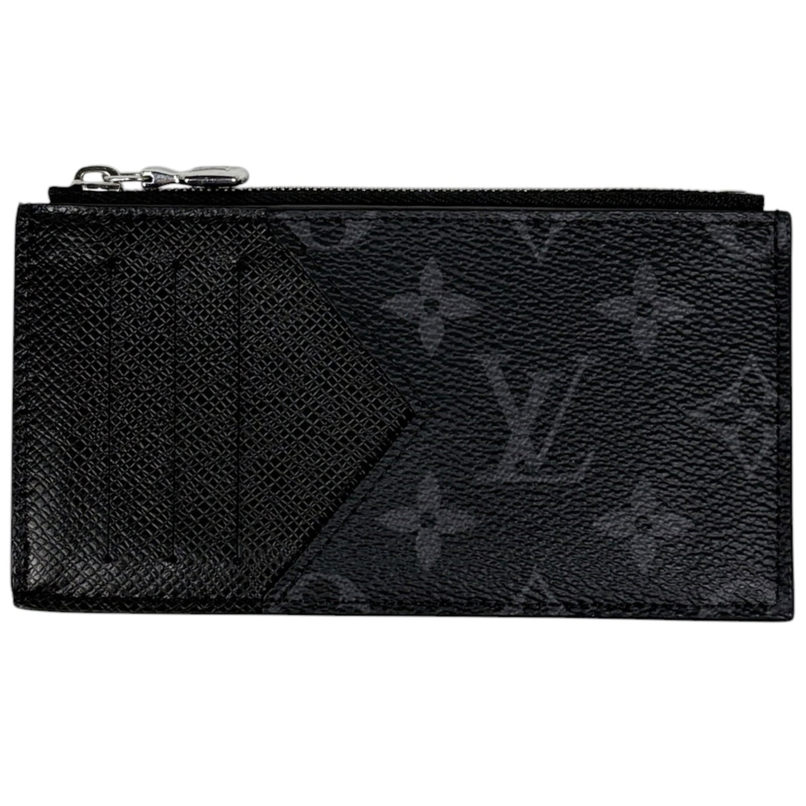 Taigarama Louis Vuitton Card Case: Taigarama Louis Vuitton Card Case A sleek and sophisticated accessory for the modern gentleman, this Louis Vuitton card case boasts the iconic Taigarama design in luxurious black leather. With its cla