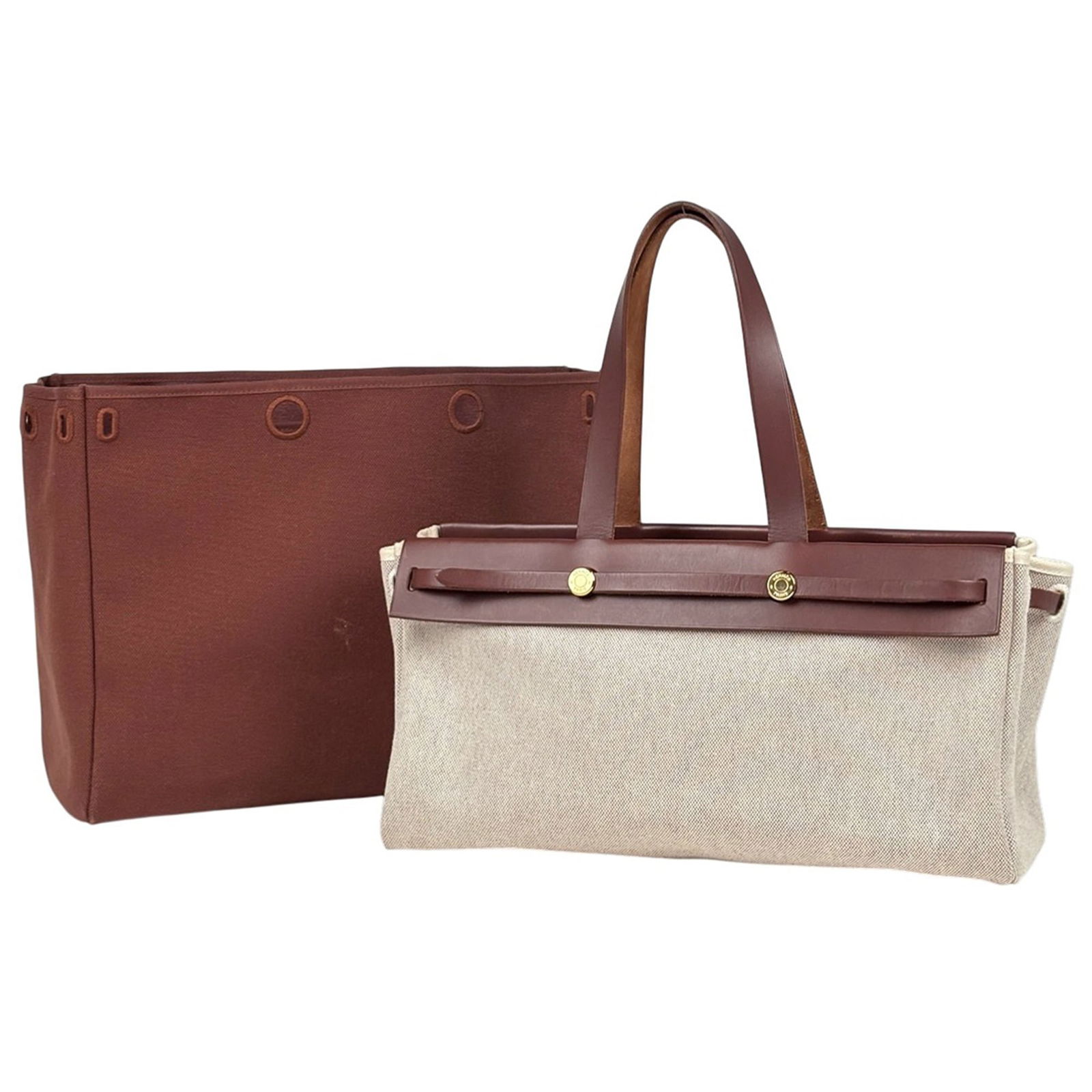 Hermes Toile H Leather Shoulder Tote Bag: Hermes Toile H Leather Shoulder Tote Bag A timeless and elegant option for the discerning woman, this pre-owned Hermes Toile H Leather Shoulder Tote Bag boasts the iconic brand's signature style with