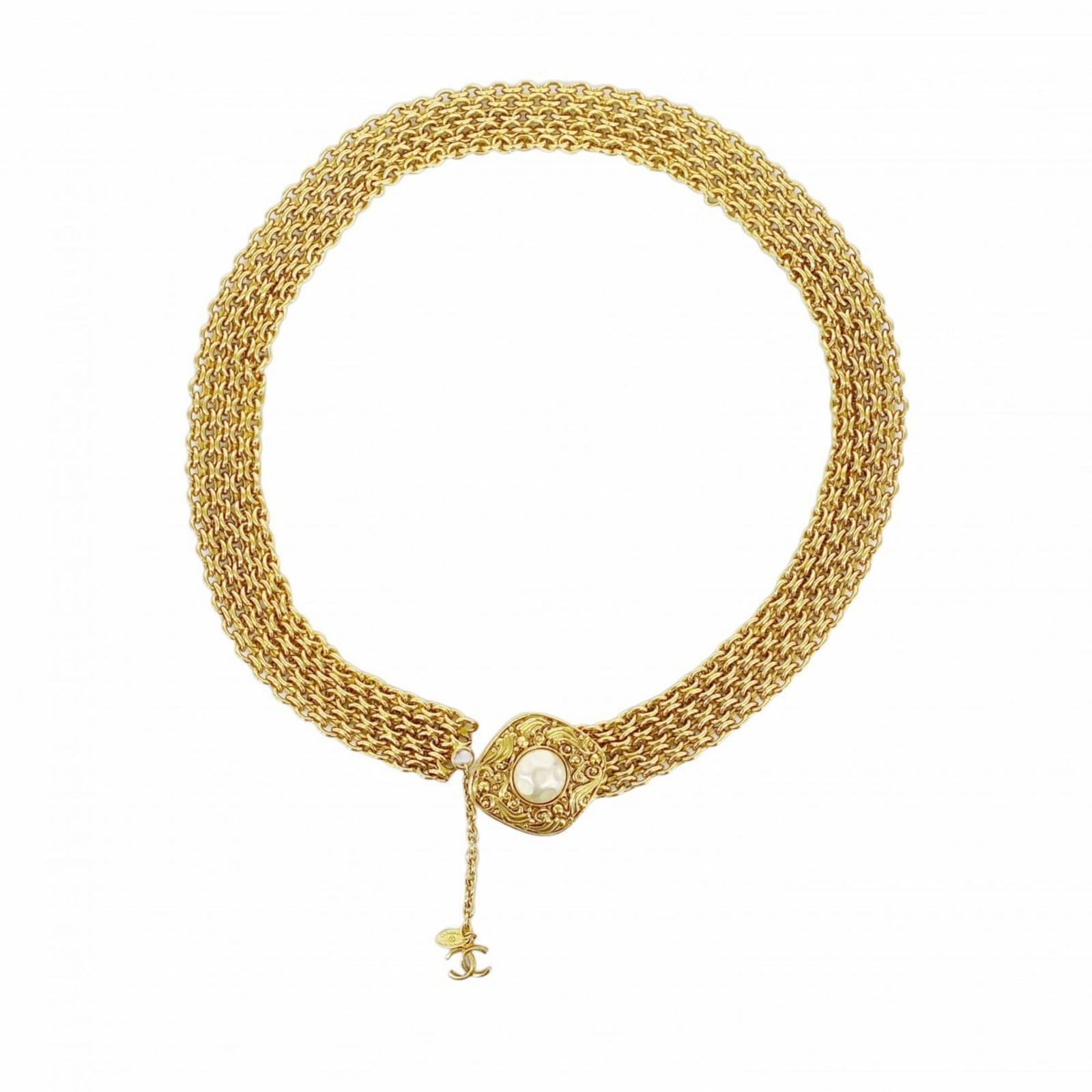Belt Chanel Chain: Belt Chanel Chain A luxurious gold chain belt from the iconic Chanel brand, adding a touch of sophistication to any outfit with its sleek design and classic style. With a length of 75.5cm, this belt