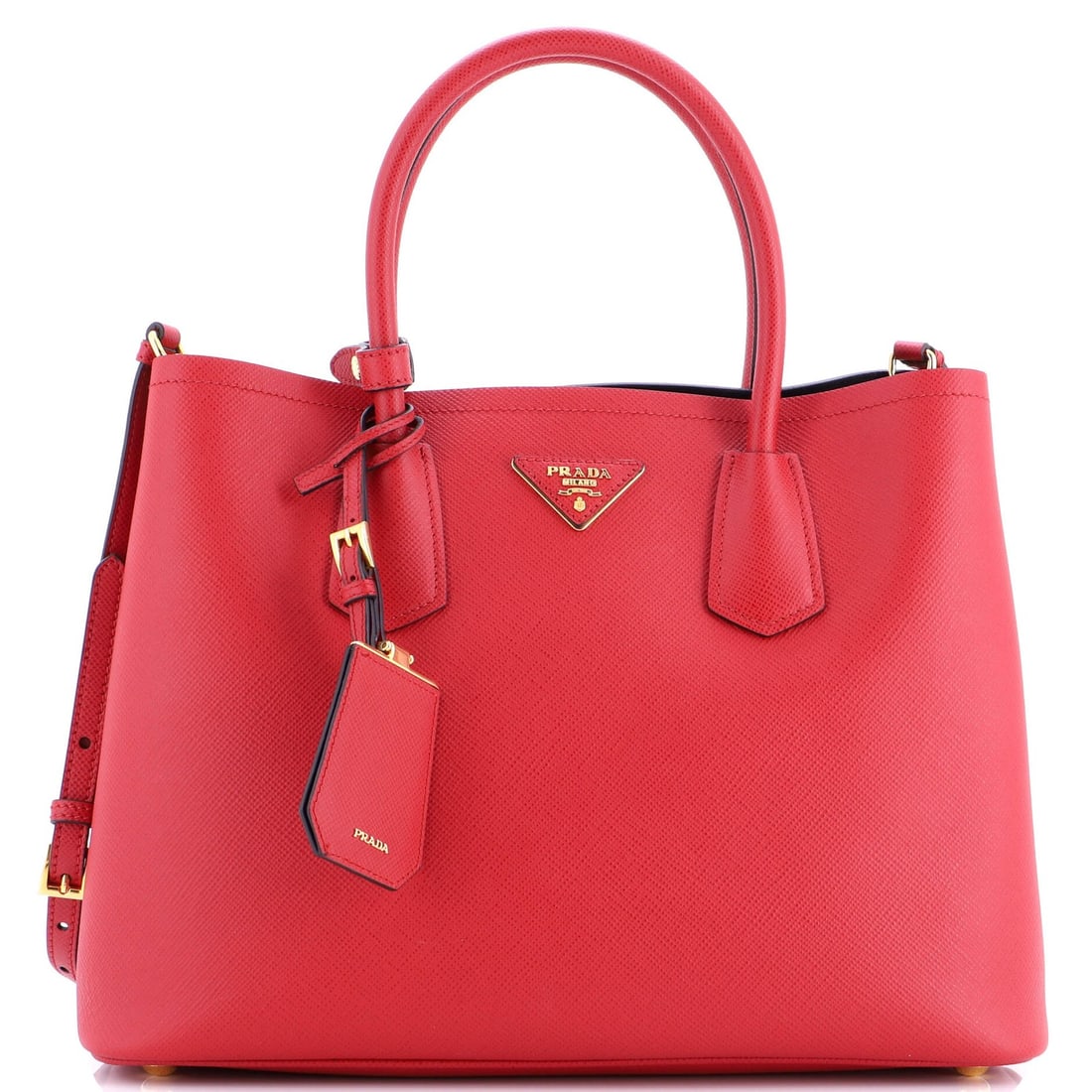 Prada Cuir Double Tote in Saffiano Leather Medium: Prada Cuir Double Tote in Saffiano Leather Medium Experience the timeless elegance of Prada's iconic Cuir Double Tote in rich, bold red Saffiano leather. This medium-sized tote boasts clean lines,
