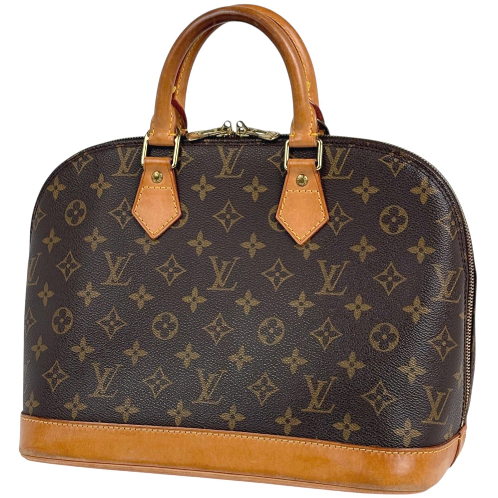 Louis Vuitton Monogram Handbag: Louis Vuitton Monogram Handbag A timeless piece of luxury, this Louis Vuitton Monogram handbag boasts the iconic brand's signature brown monogram pattern and classic design. With its spacious interior